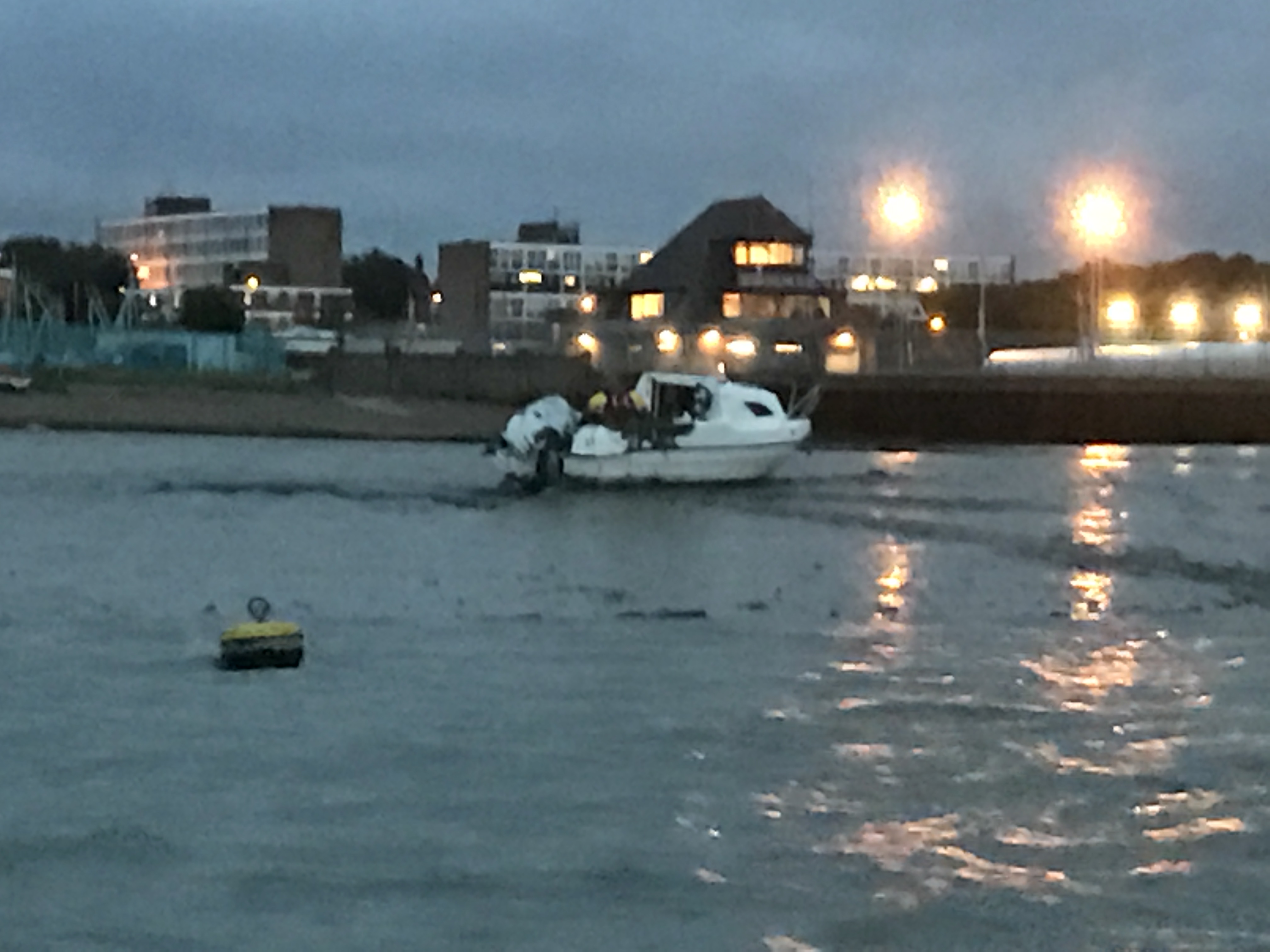 The casualty craft high and dry on a mud bank