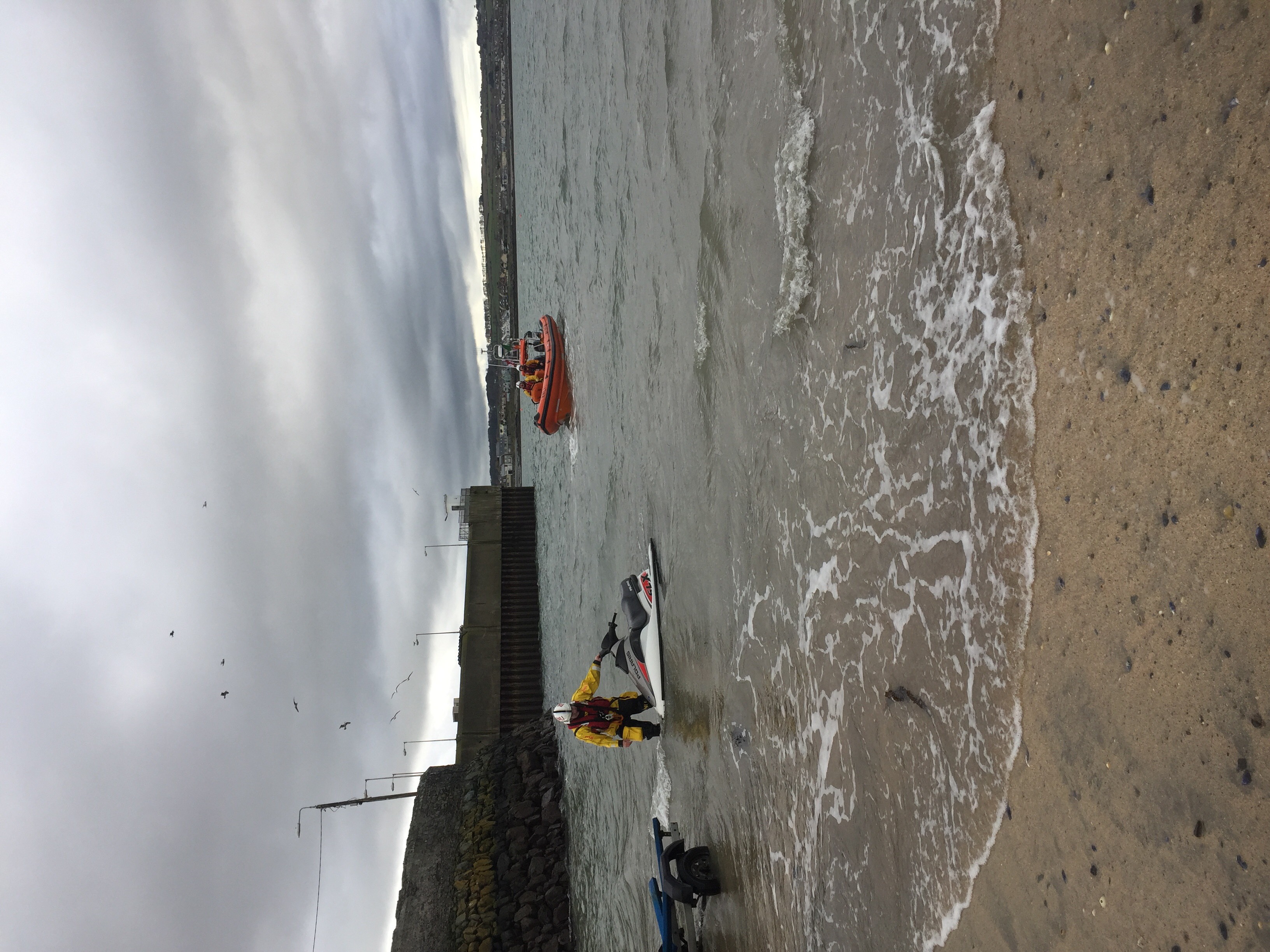 Skerries RNLI Returning Personal Water Craft to the beach