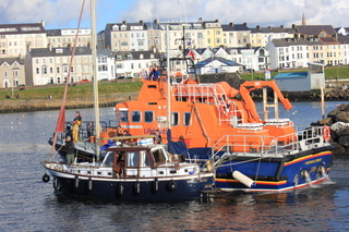 Portrush RNLI bring cruiser under tow to Portrush harbour