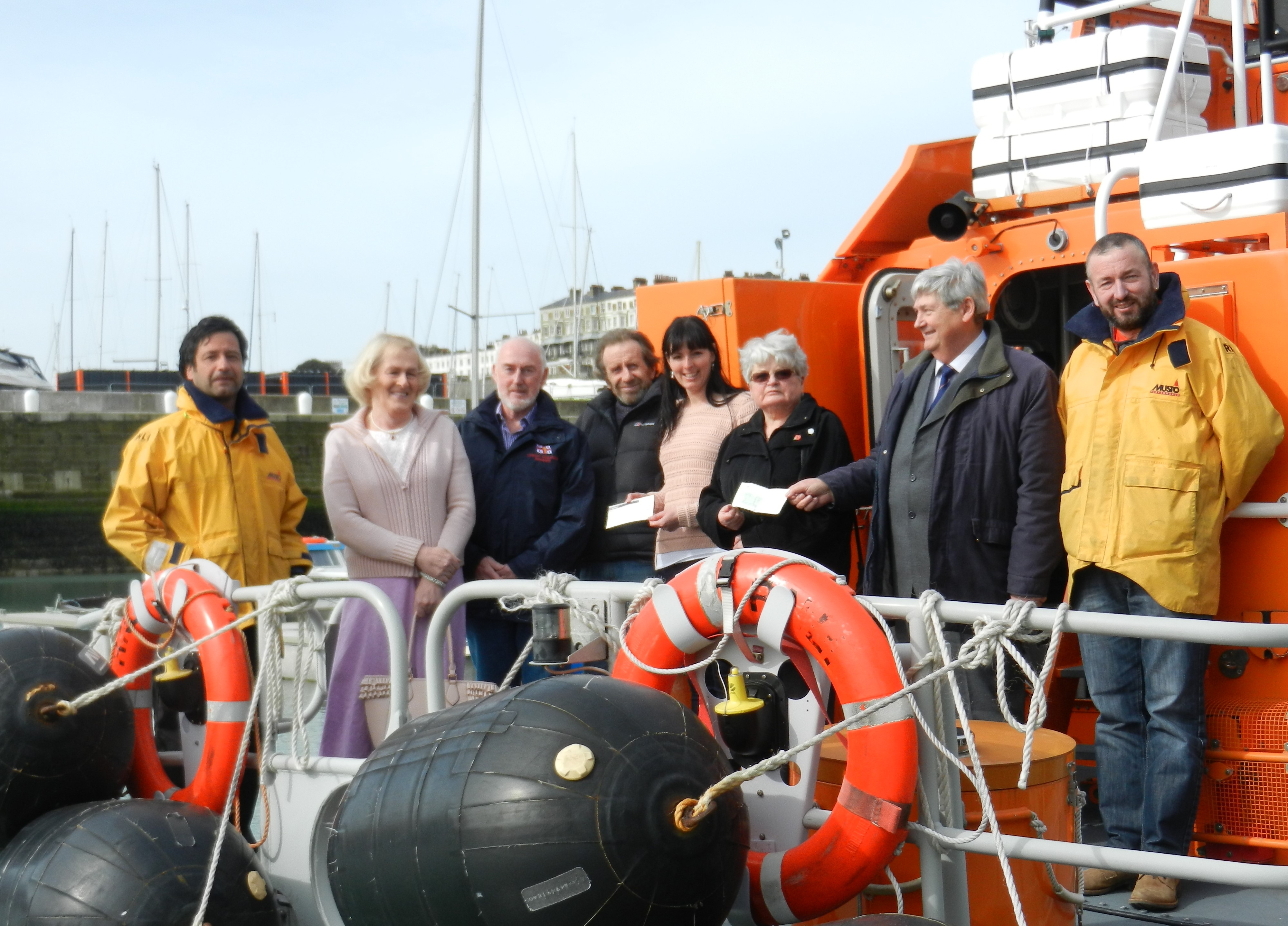 Counillors and business owners hand over their cheque to Ramsgate LOM