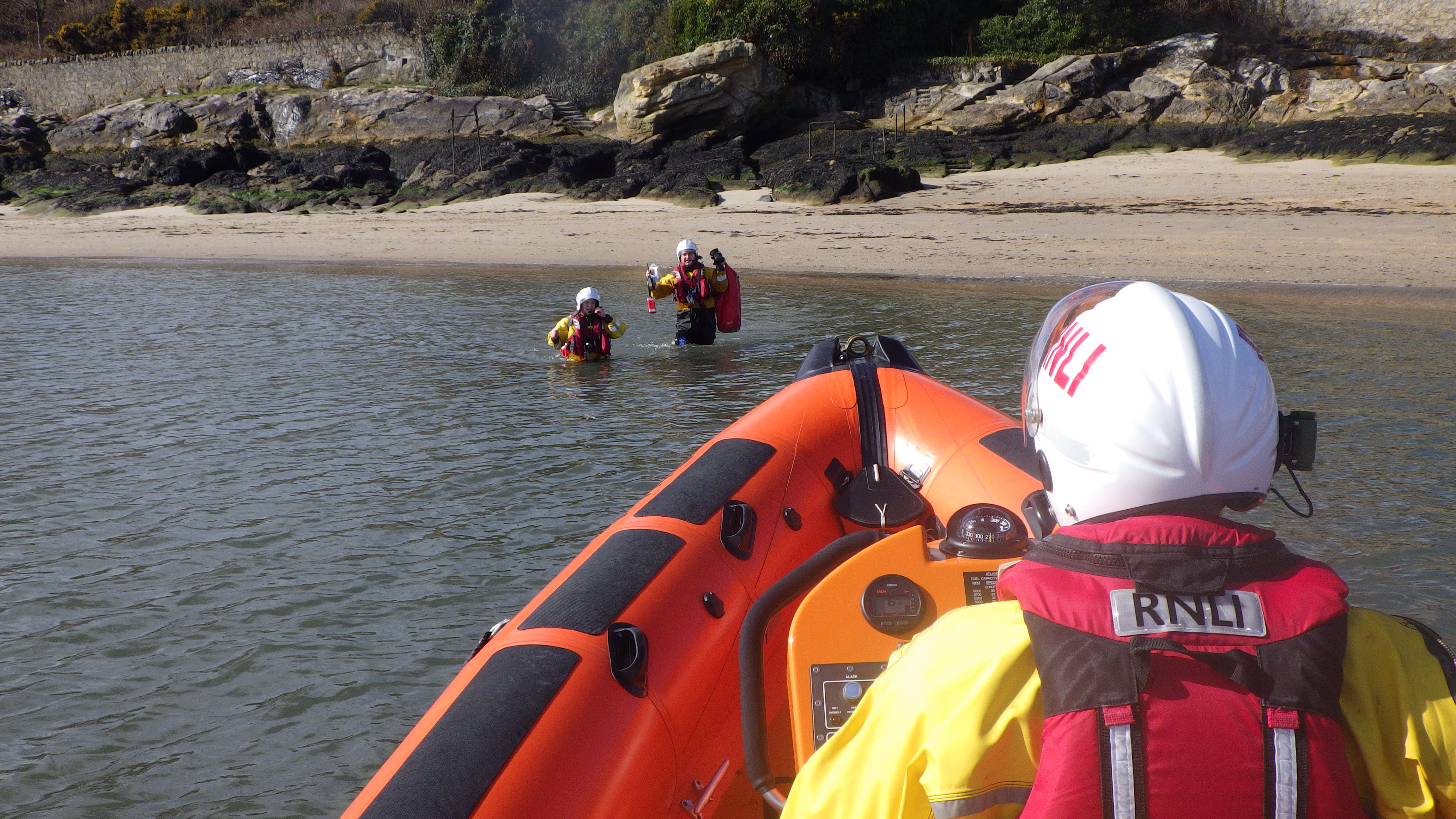 Crewmembers return to the lifeboat