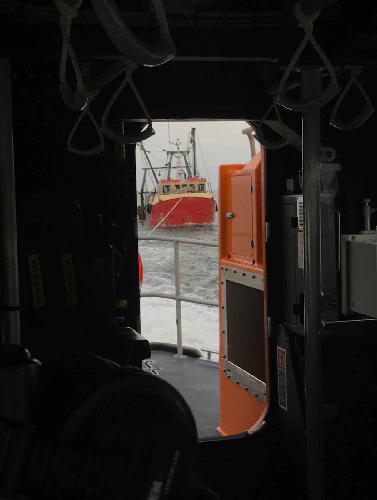 Shannon class lifeboat R and J Welburn towing local Scalloper 