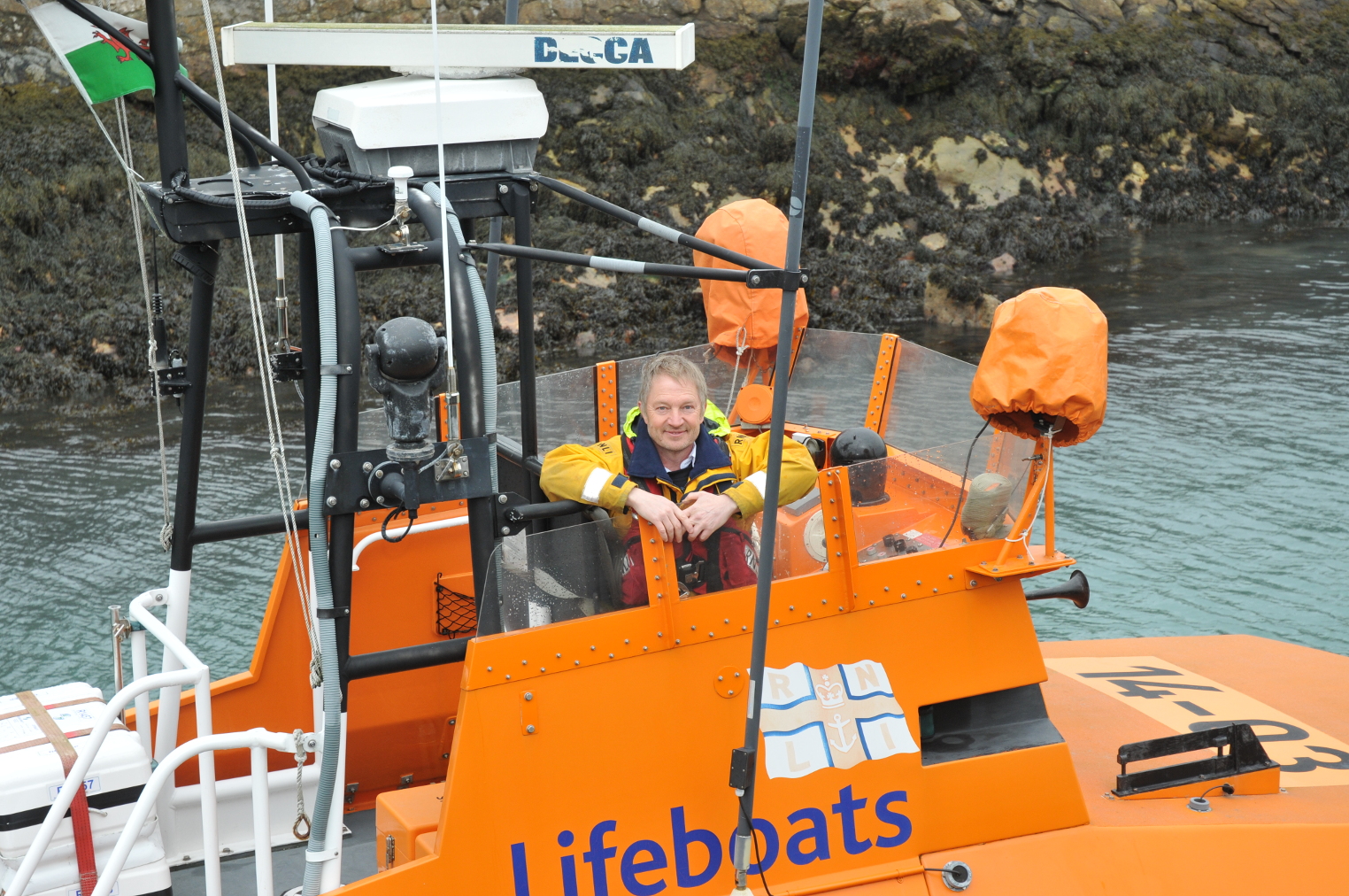 Fishguard RNLI Coxswain Paul Butler has stood down after 24 years of service