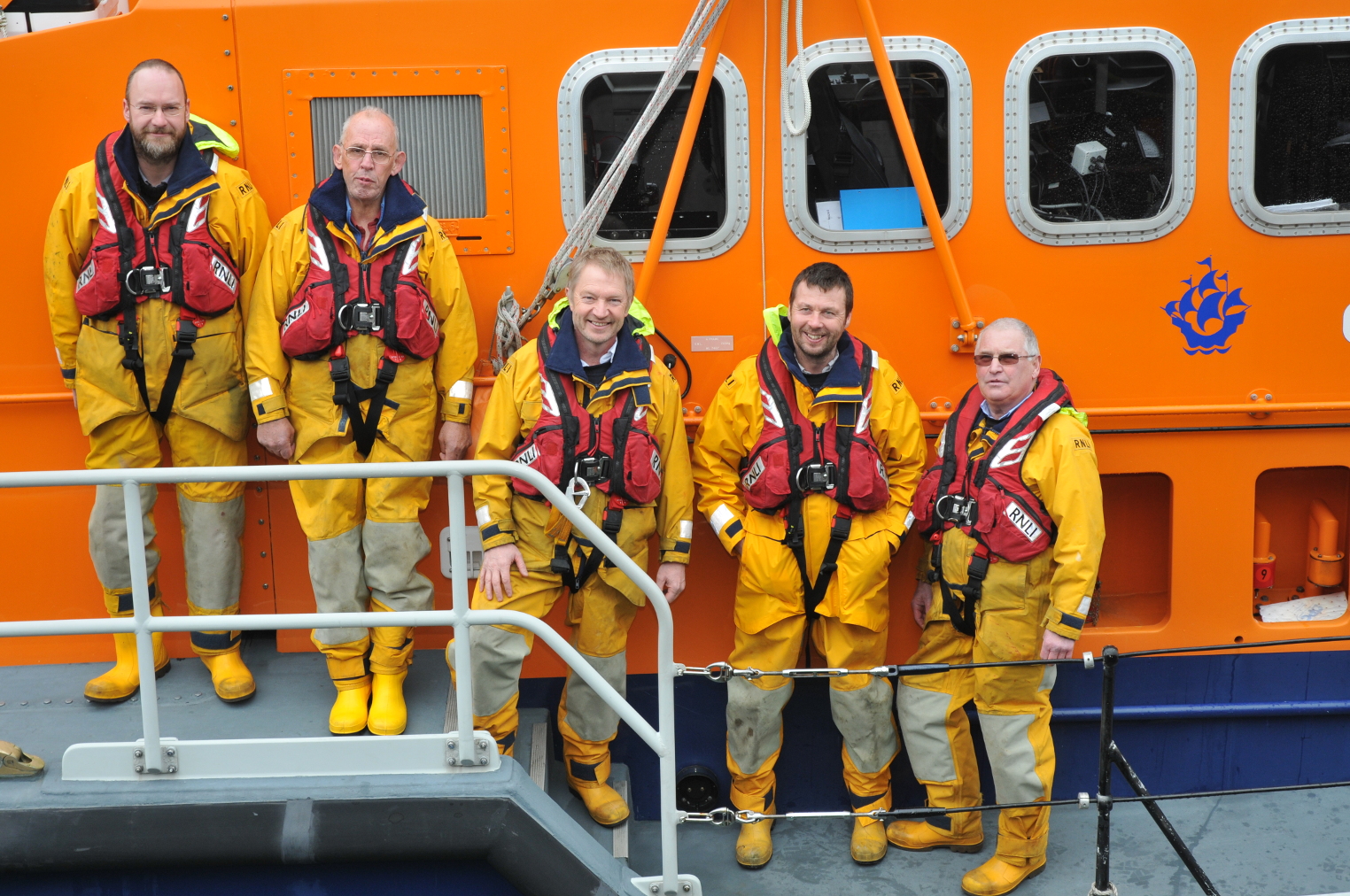 Paul Butler (centre) with fellow Fishguard RNLI crew
