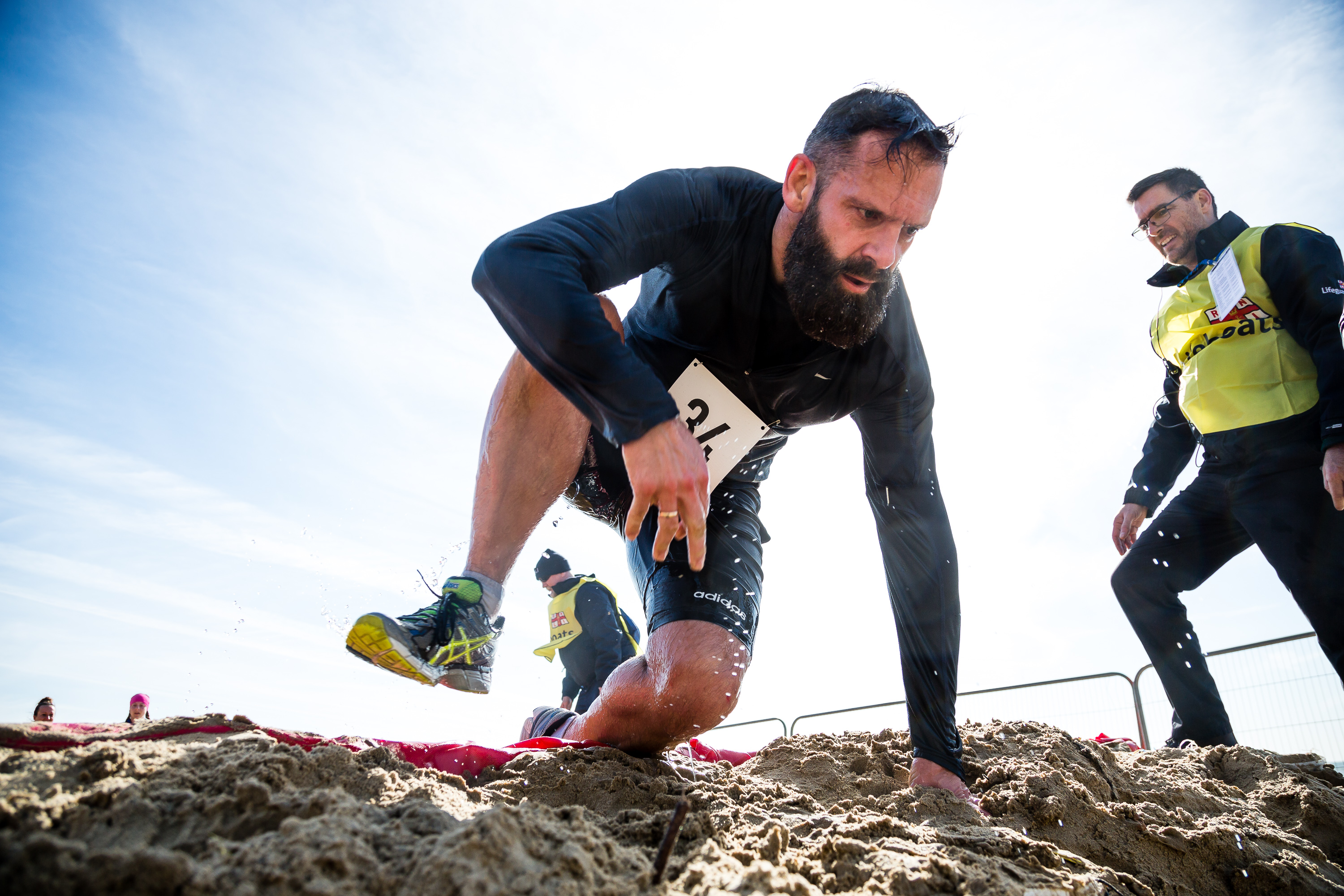 A Sandstorm participant takes on the gruelling obstacles.