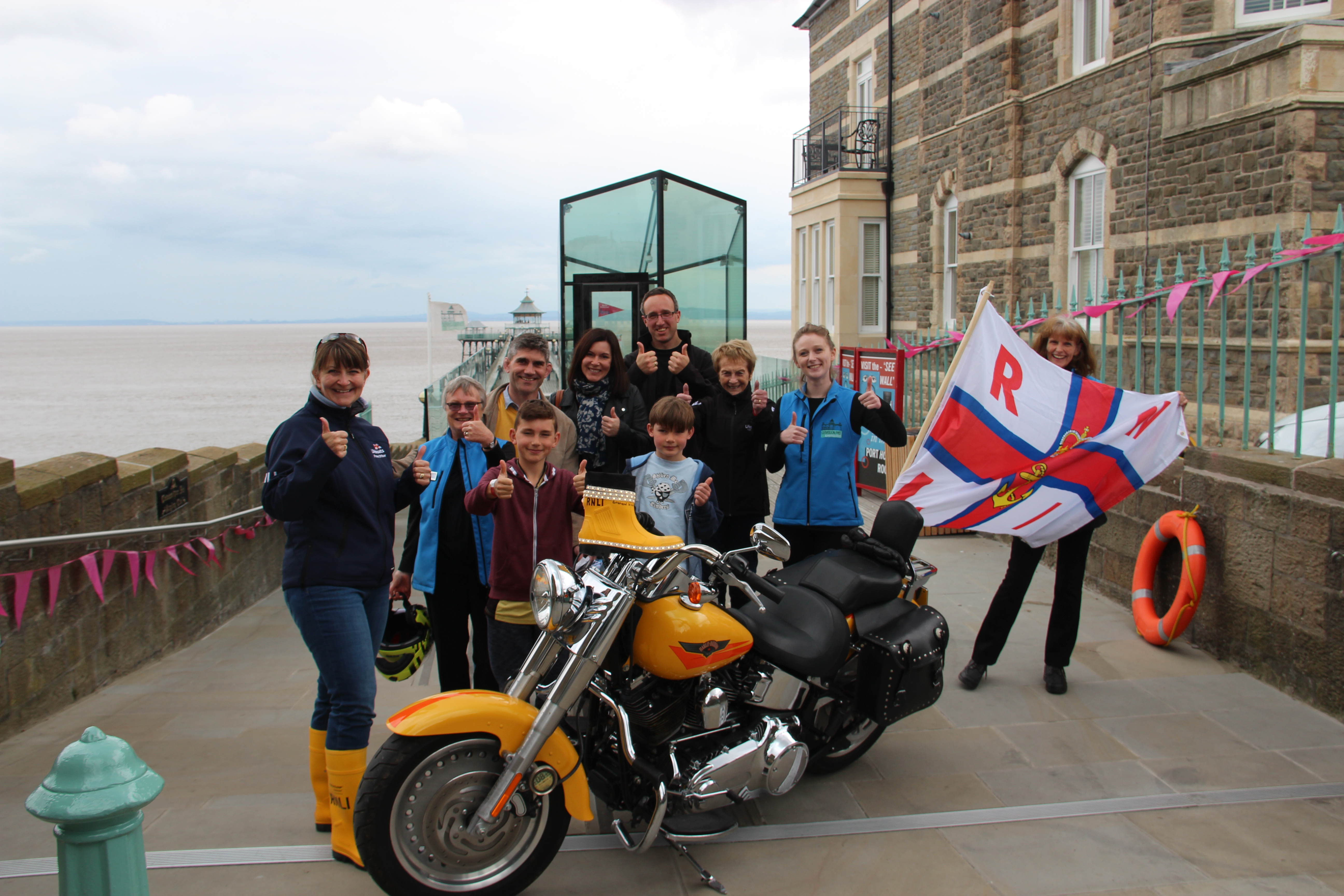 Simon (centre back) arrives at Clevedon Pier with the Yellow Welly
