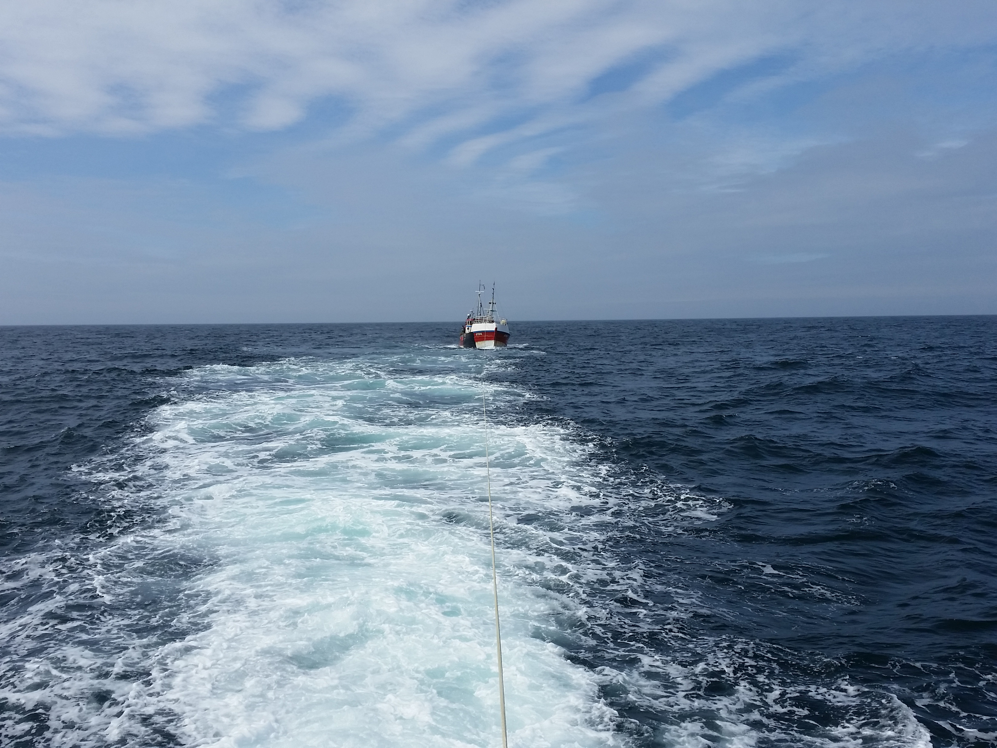 The fishing vessel, with a fouled propellor, is towed to safety by Angle RNLI's Tamar class all weather lifeboat Mark Mason on Monday, May 22