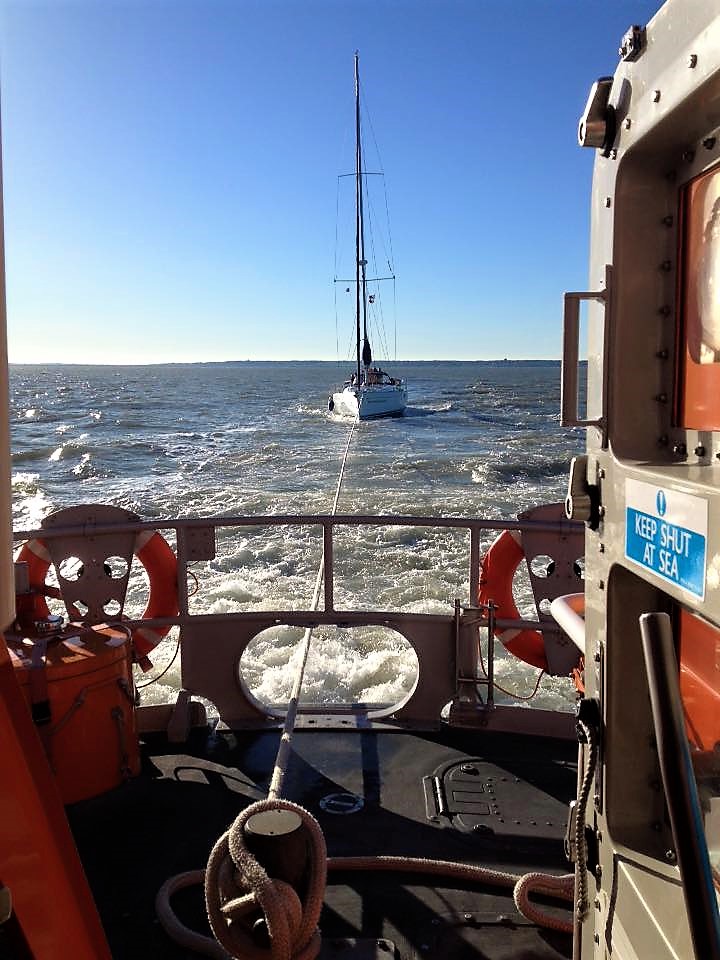 The Belgian yacht Sealord with engine problems is towed back to Queenborough Harbour