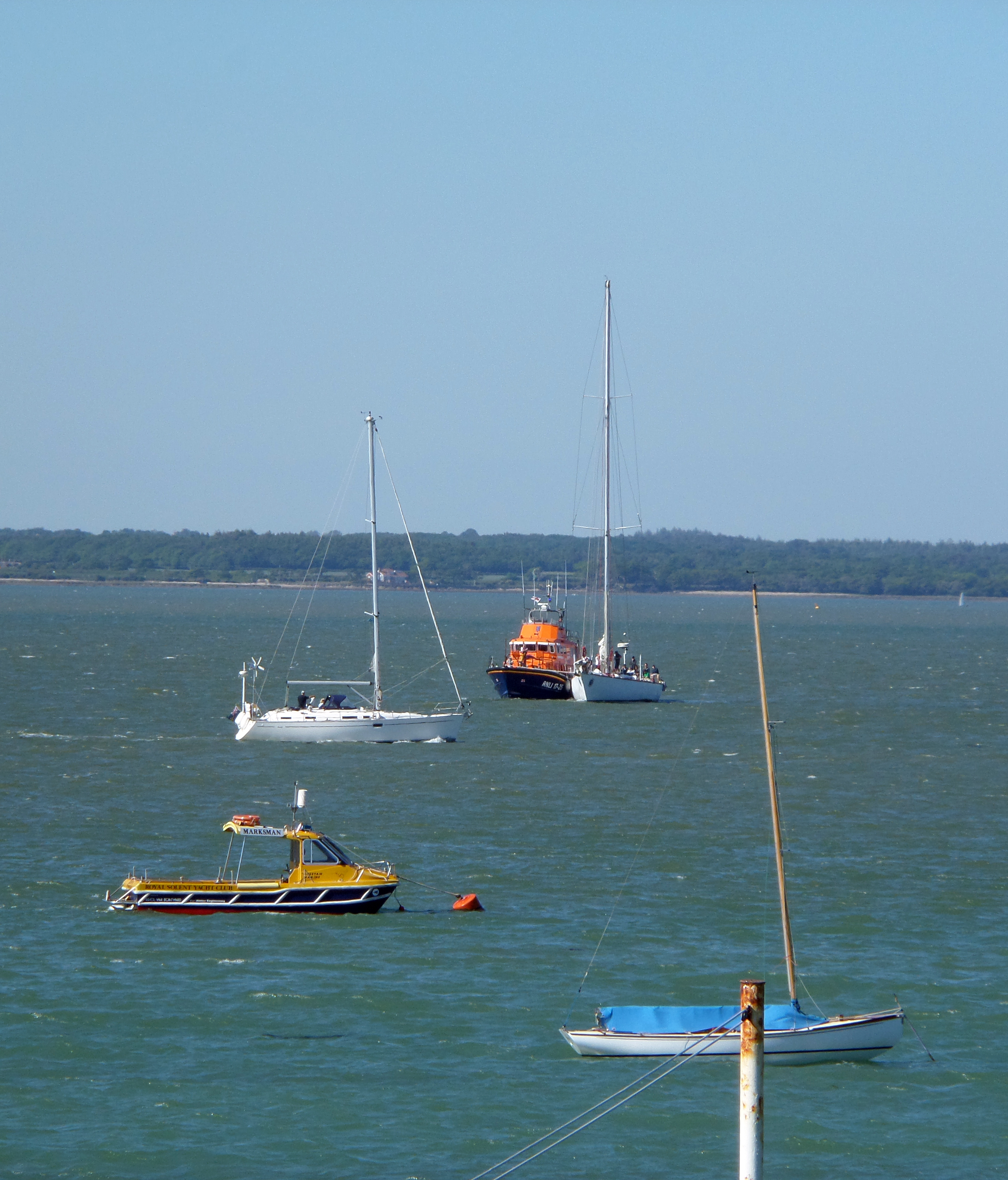 Yacht Great Britain II under tow by the RNLI Yarmouth lifeboat