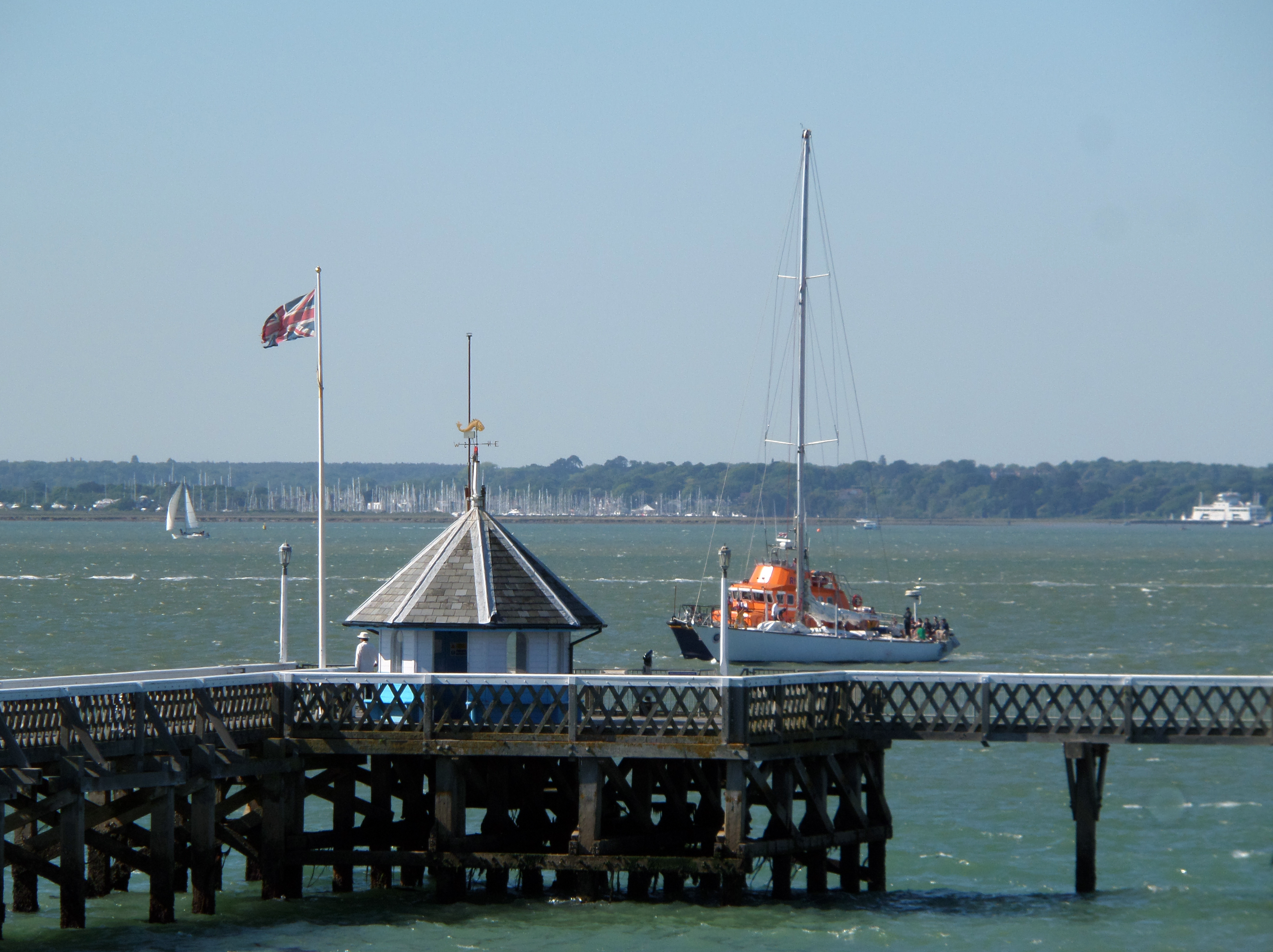 Yacht Great Britain II under tow by the RNLI Yarmouth lifeboat