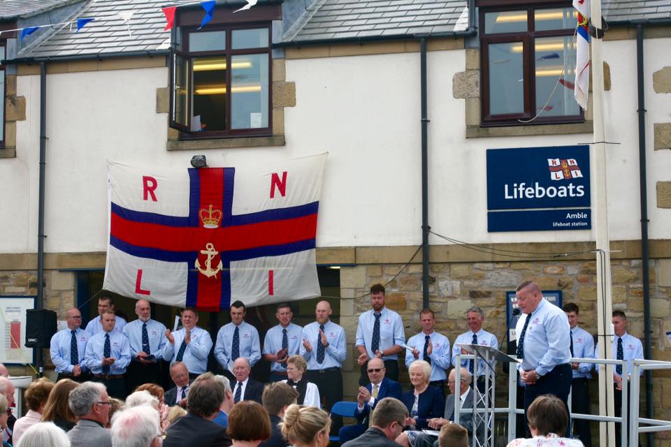 Lifeboat Operations Manager John Wingfield accepts lifeboat on behalf of Amble lifeboat station