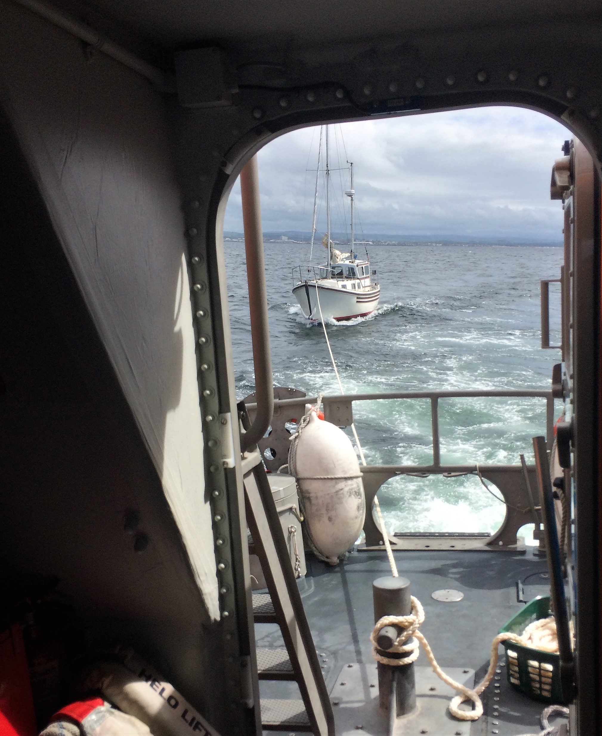 Casualty vessel under tow by the Trent class all-weather lifeboat