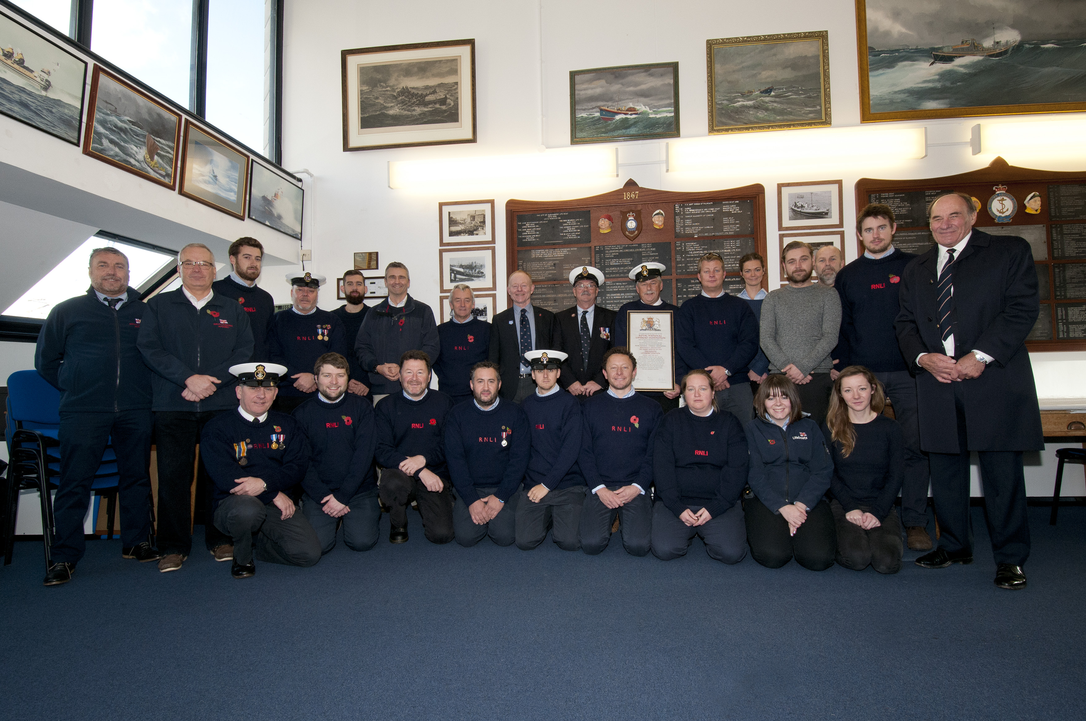 Falmouth lifeboat crew with 150th Vellum