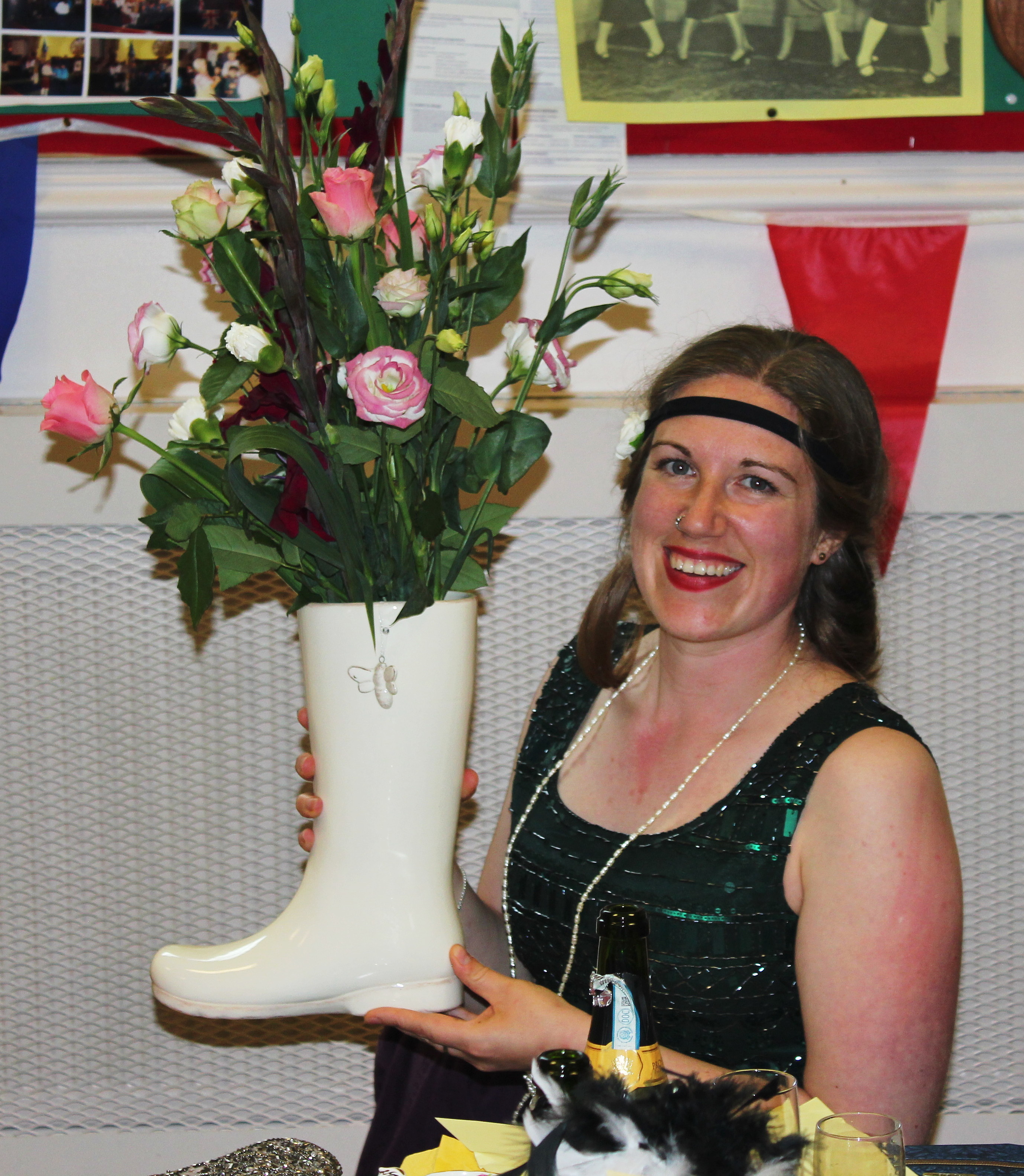 Lucky Seat winner Kate Smith receives her prize - welly filled with flowers