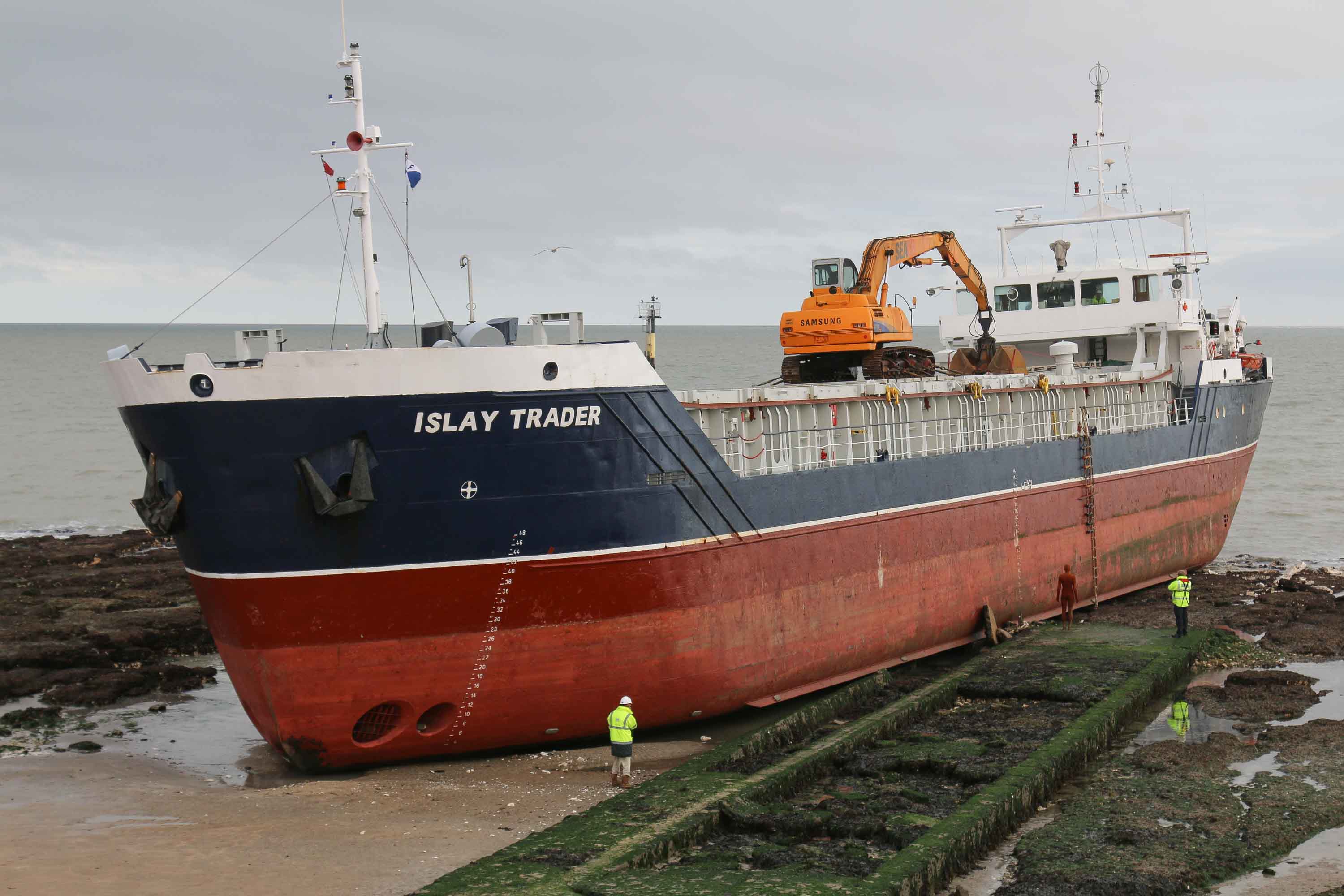 The ship is seen here high and dry at low tide.
