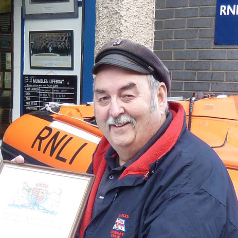 Brian Jeffrey receiving one of many Velum he was awarded at the station