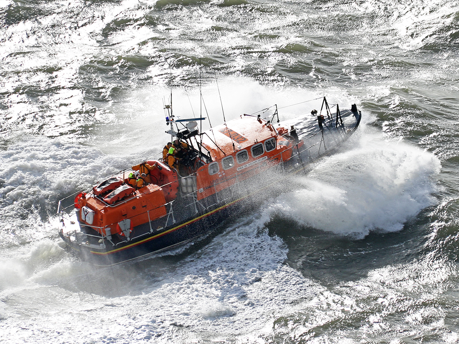 Douglas lifeboat Sir William Hillary searching in heavy seas off the Marine Drive