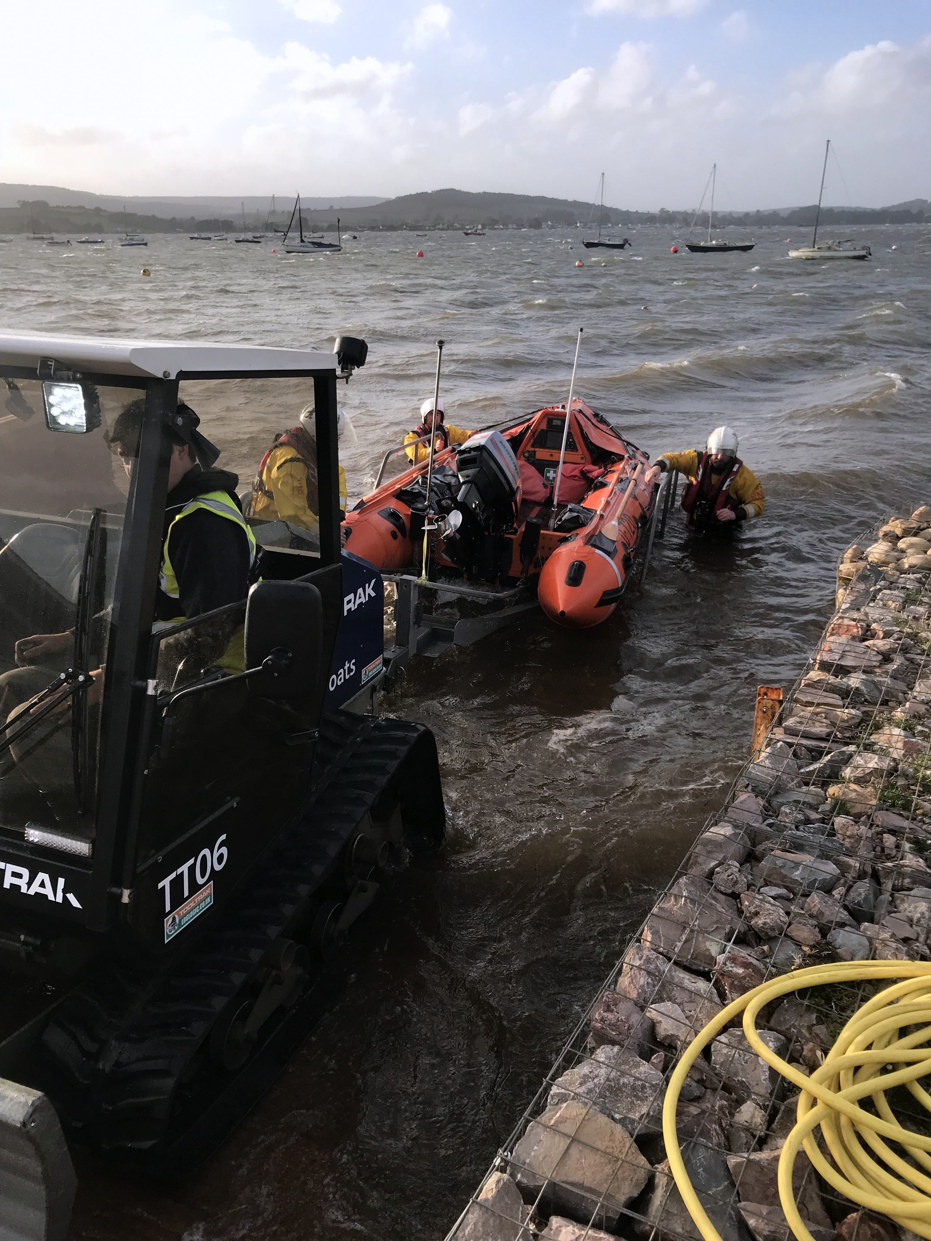 Crew volunteers recovering inshore lifeboat 