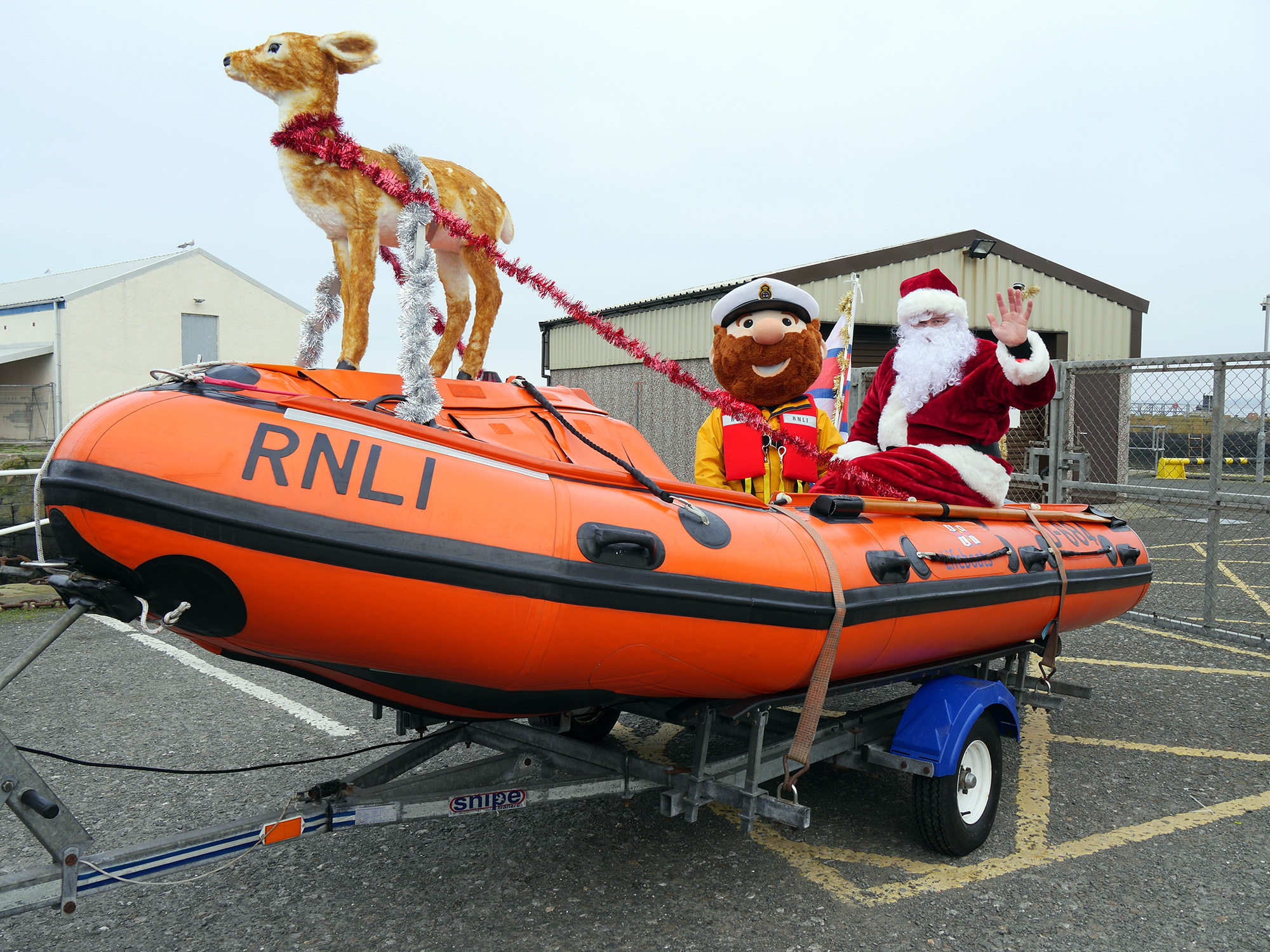 Santa and RNLI mascot Stormy Stan aboard Troon inshore lifeboat