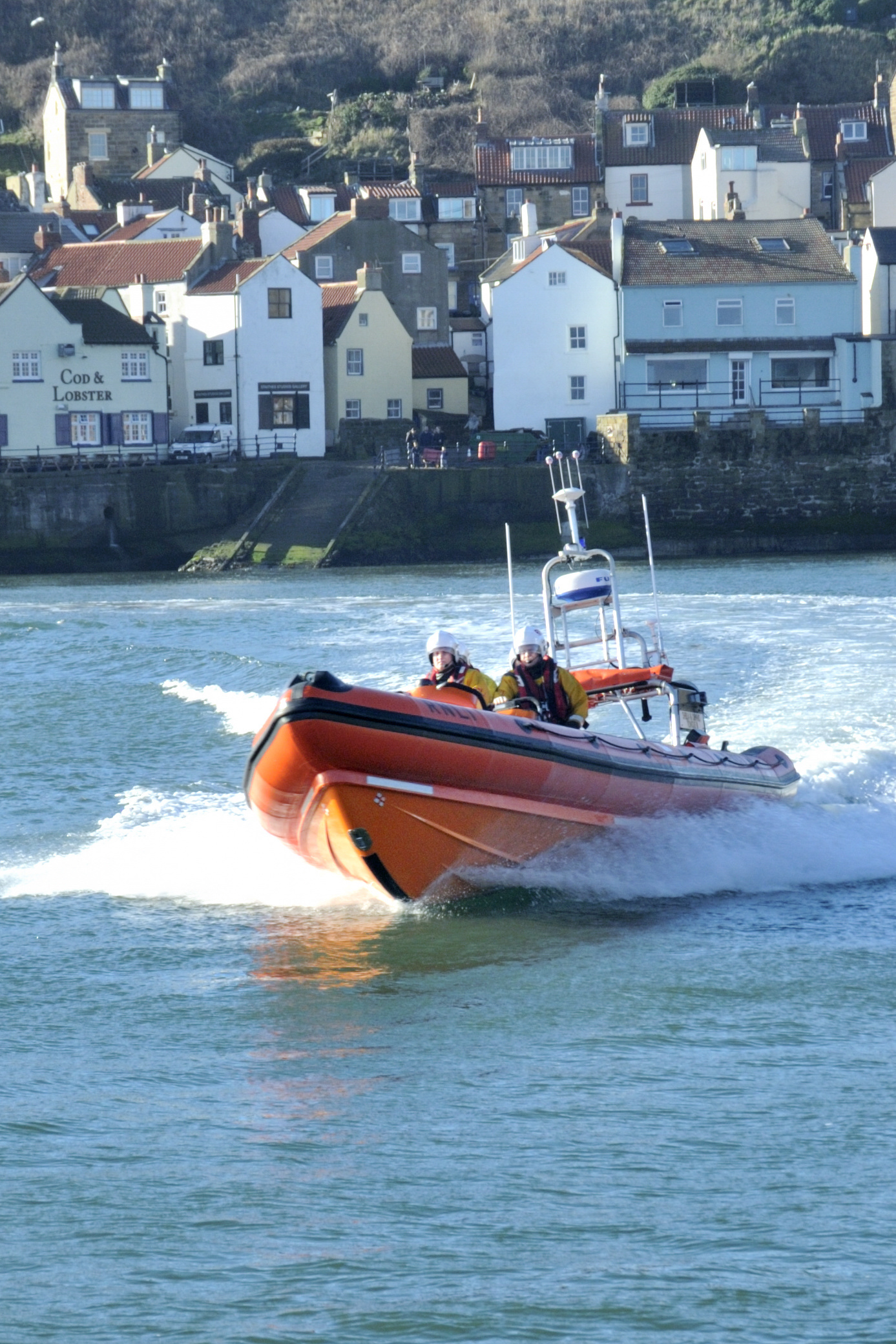 Runswick RNLI's Atlantic 85 leaving Staithes harbour