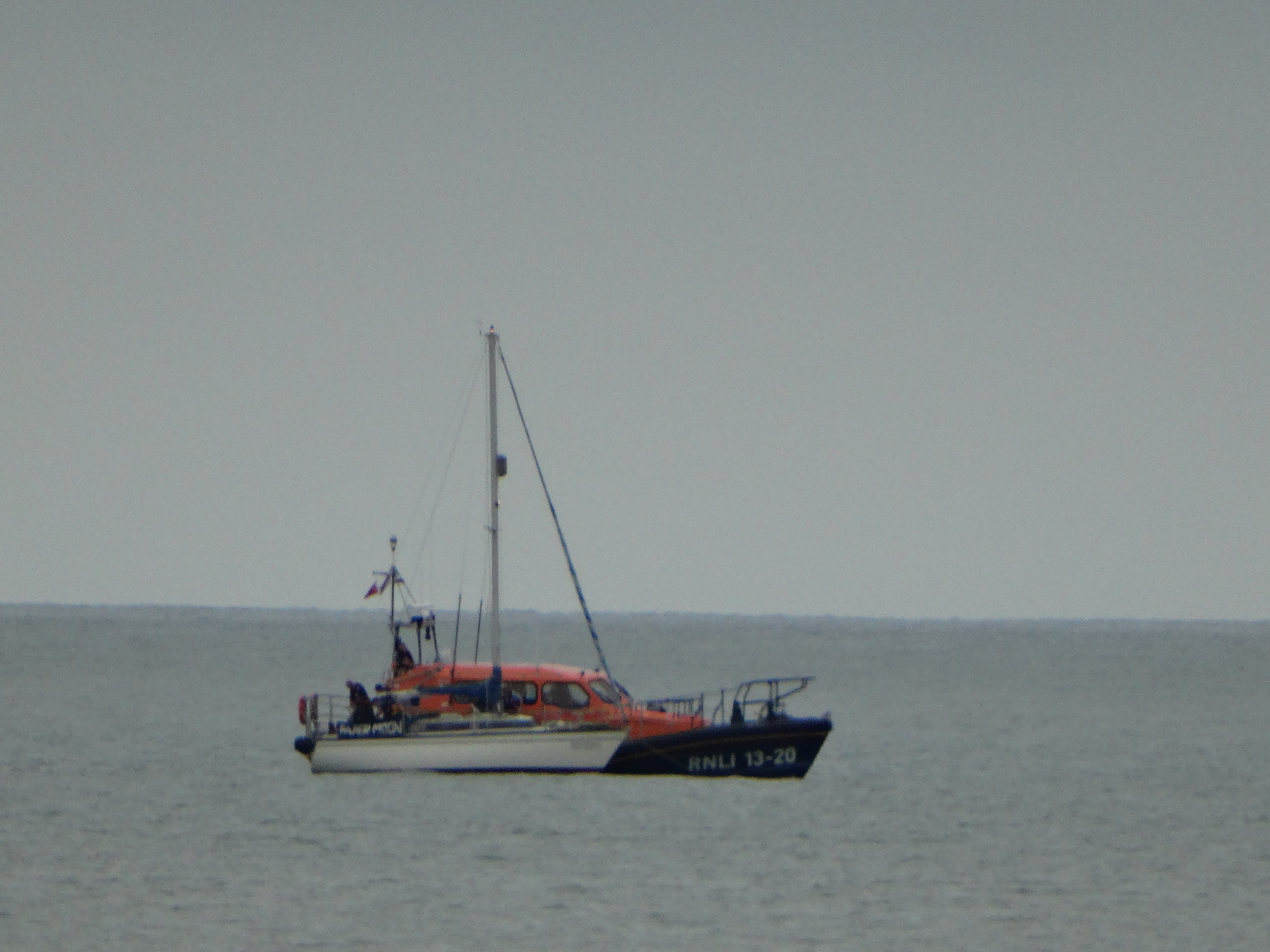 lifeboat alongside the Yacht Paper Moon