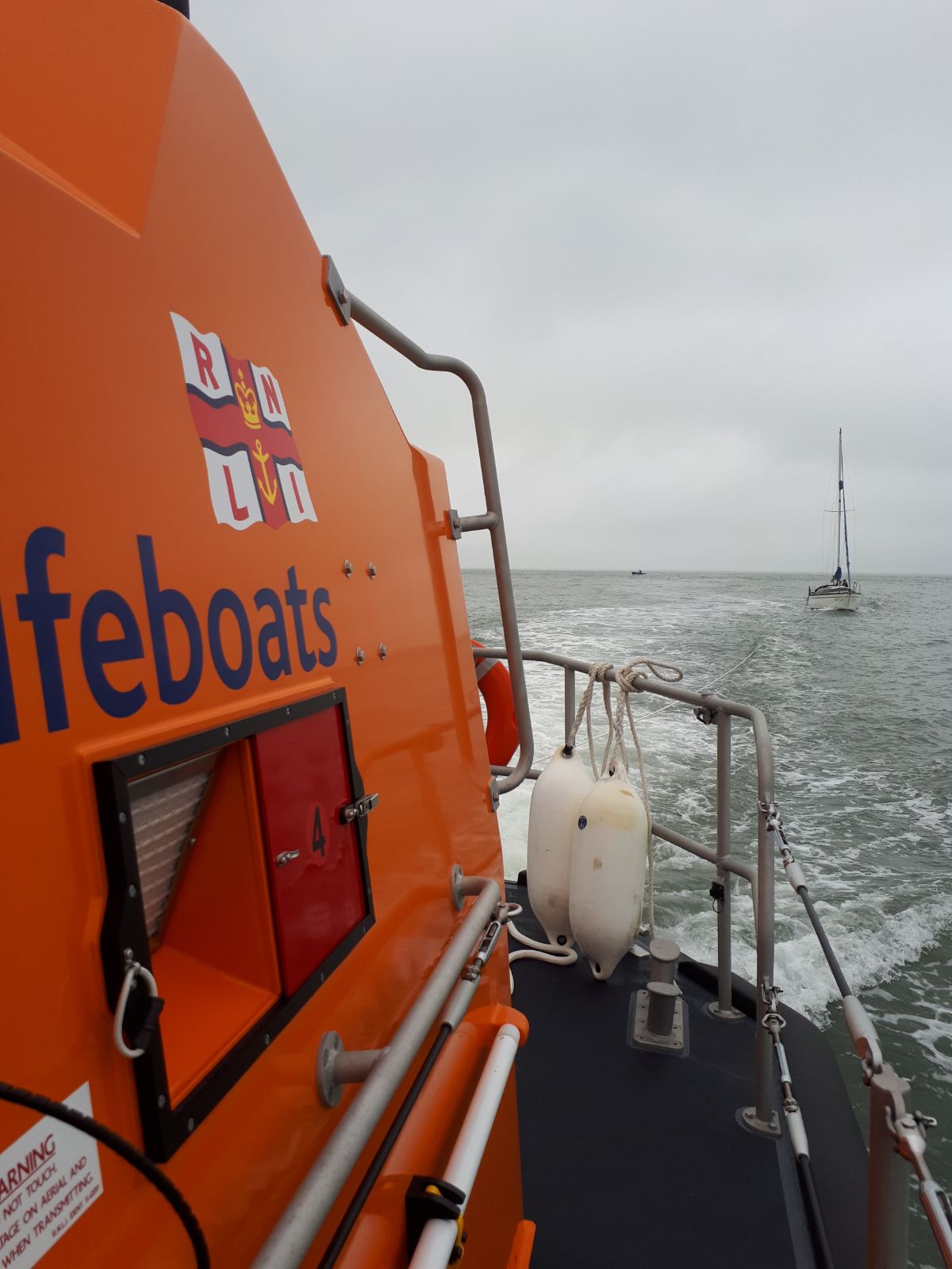 lifeboat towing casualty vessel taken from lifeboat