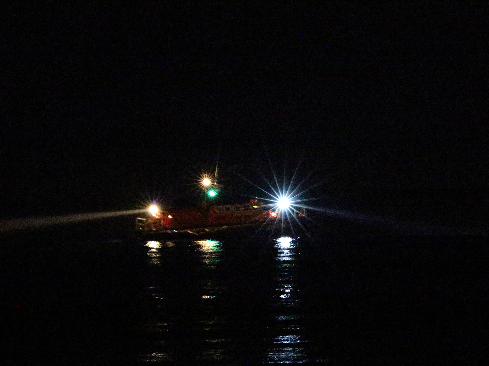 Douglas lifeboat Sir William Hillary searching the Douglas shoreline