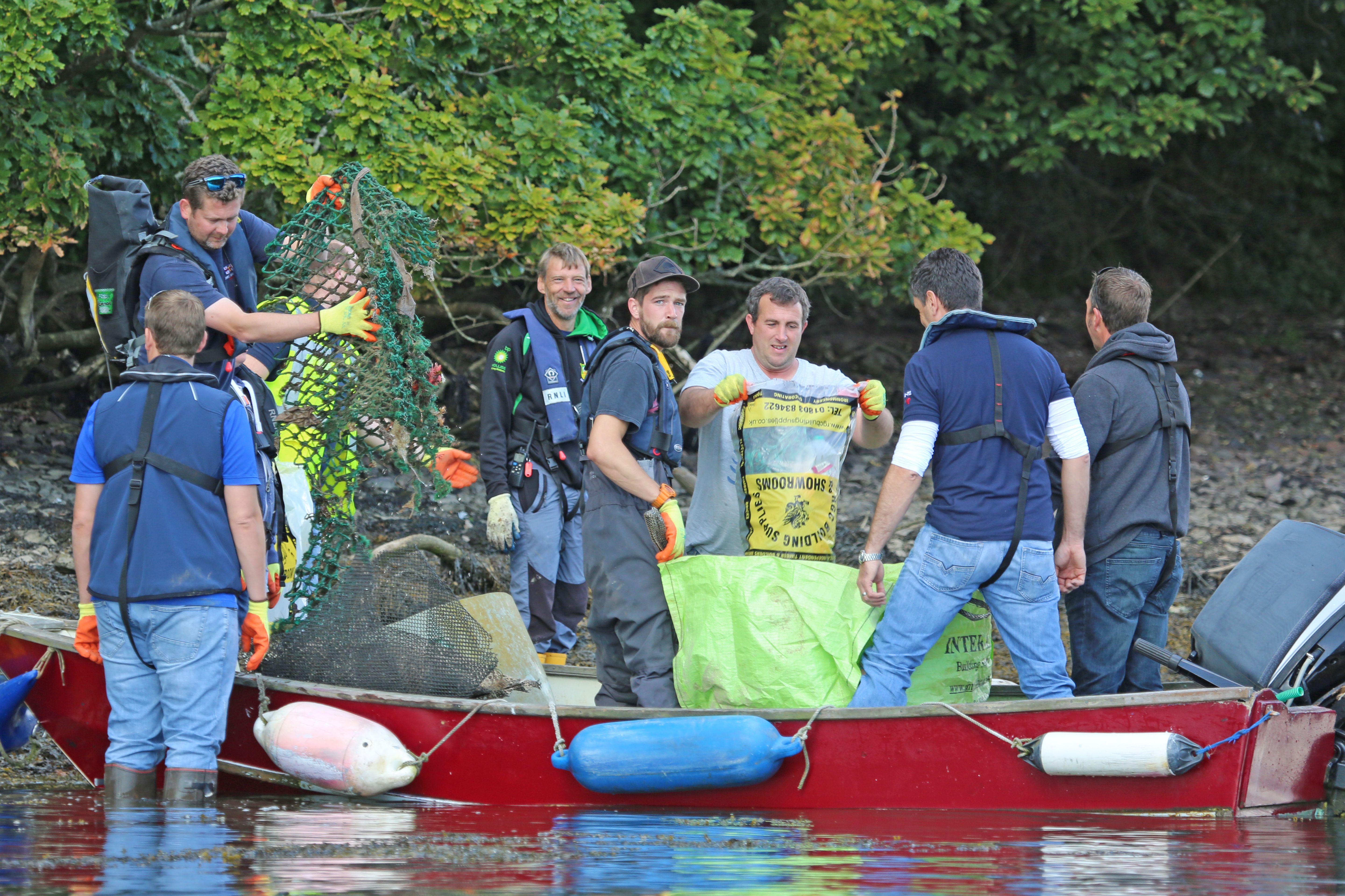 The individual RNLI volunteers emptied their bags of collected rubbish onto a RIB to be taken away.