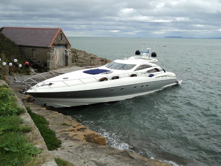 Super yacht aground on rocks