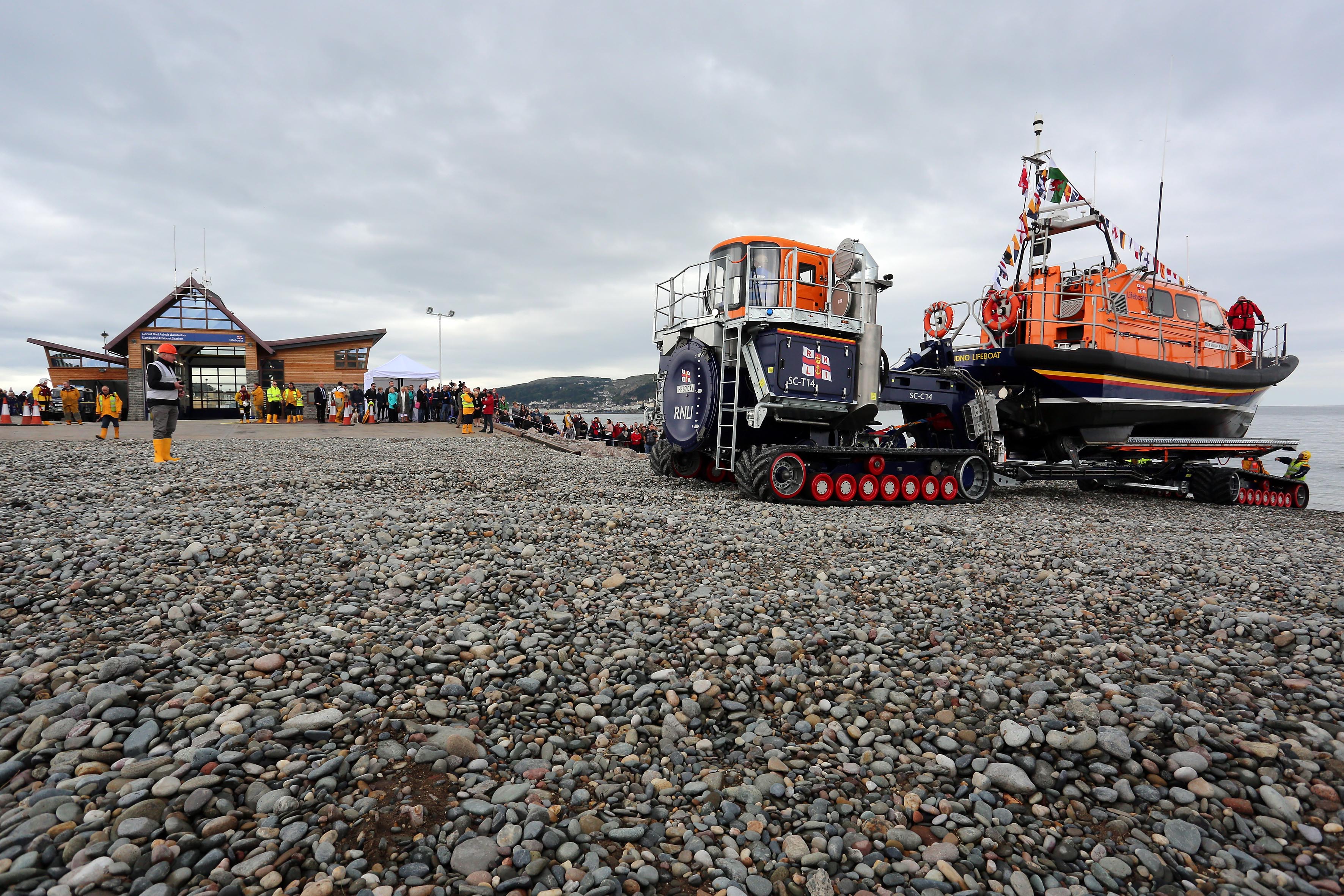 Llandudno's Shannon class lifeboat and launch and recovery kit in front of the station's new boathouse at Craig-y-Don