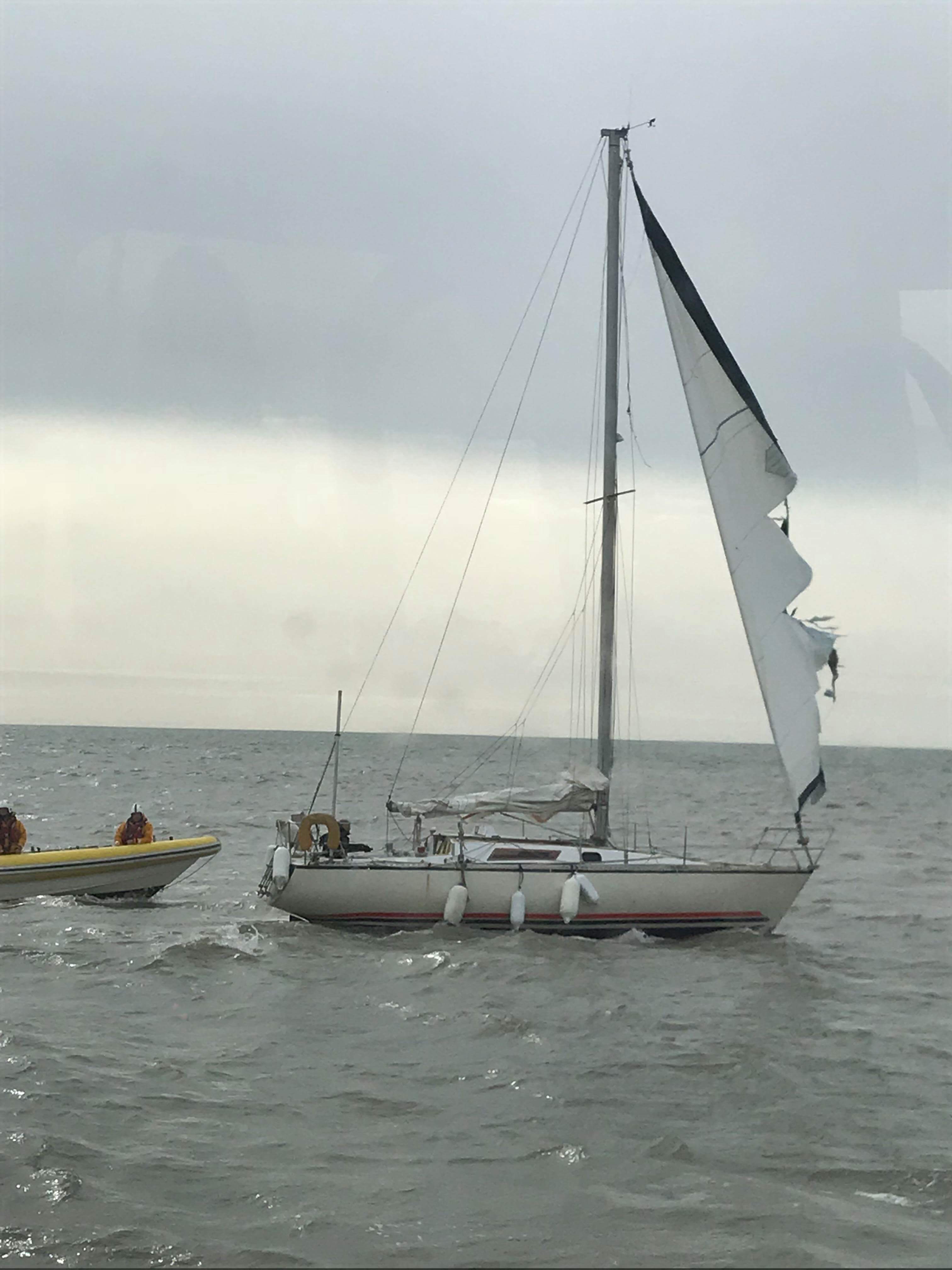 Crew on board Sea Serpent boarding yacht