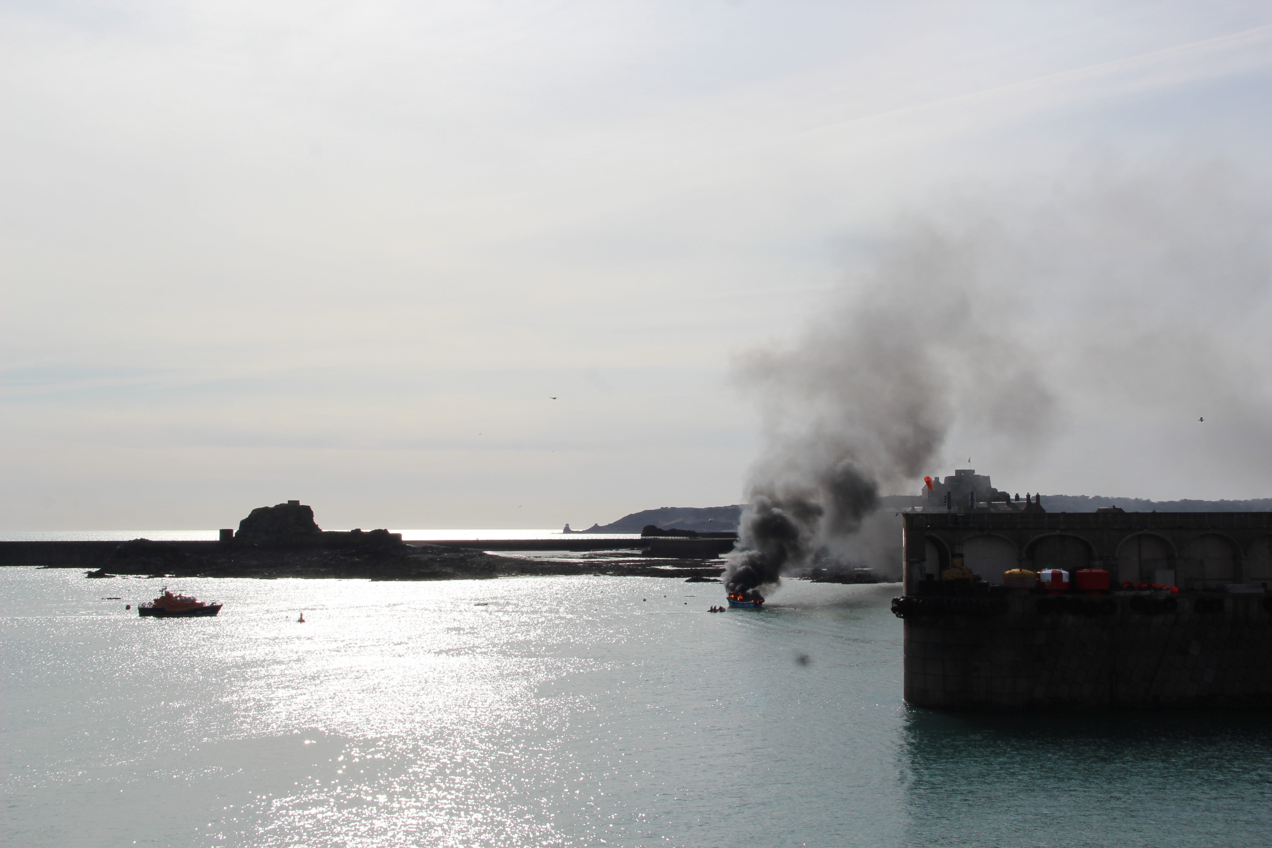 St Helier all-weather lifeboat attends a fishing boat on fire