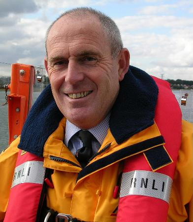 a man wearing a RNLI life jacket 