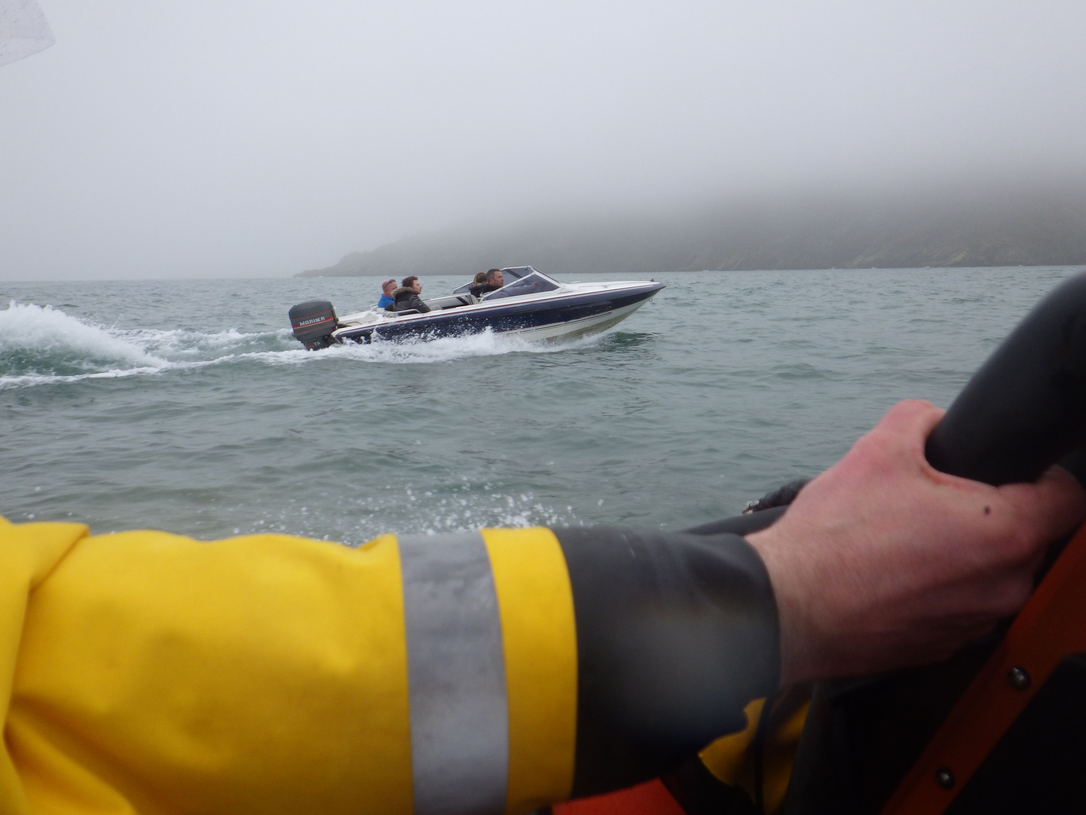 A speedboat with fuel problems was escorted back to Dartmouth