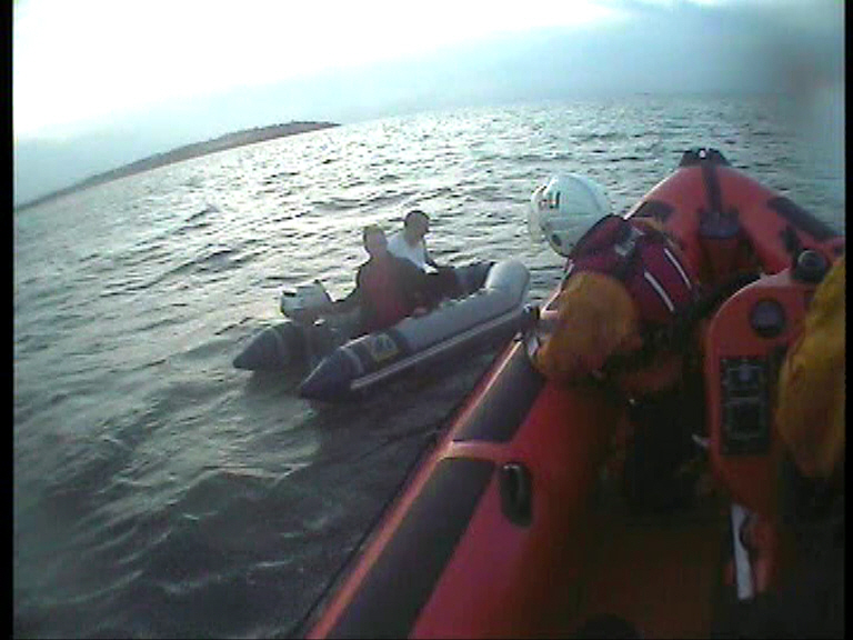Whitstable Lifeboat comes alongside the 9-foot dinghy and it's two occupants after the craft's engine broke down off Leysdown, Isle of Sheppey on Monday evening. Picture: RNLI Whitstable.