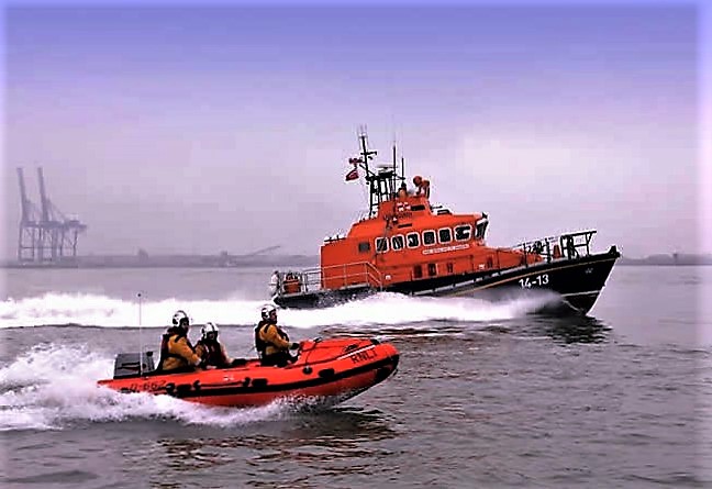 The Sheerness Trent Class all weather lifeboat 'The George and Ivy Swanson with the 'D' class inshore lifeboat 'Buster' responding to a call for assistance in the Medway estuary.