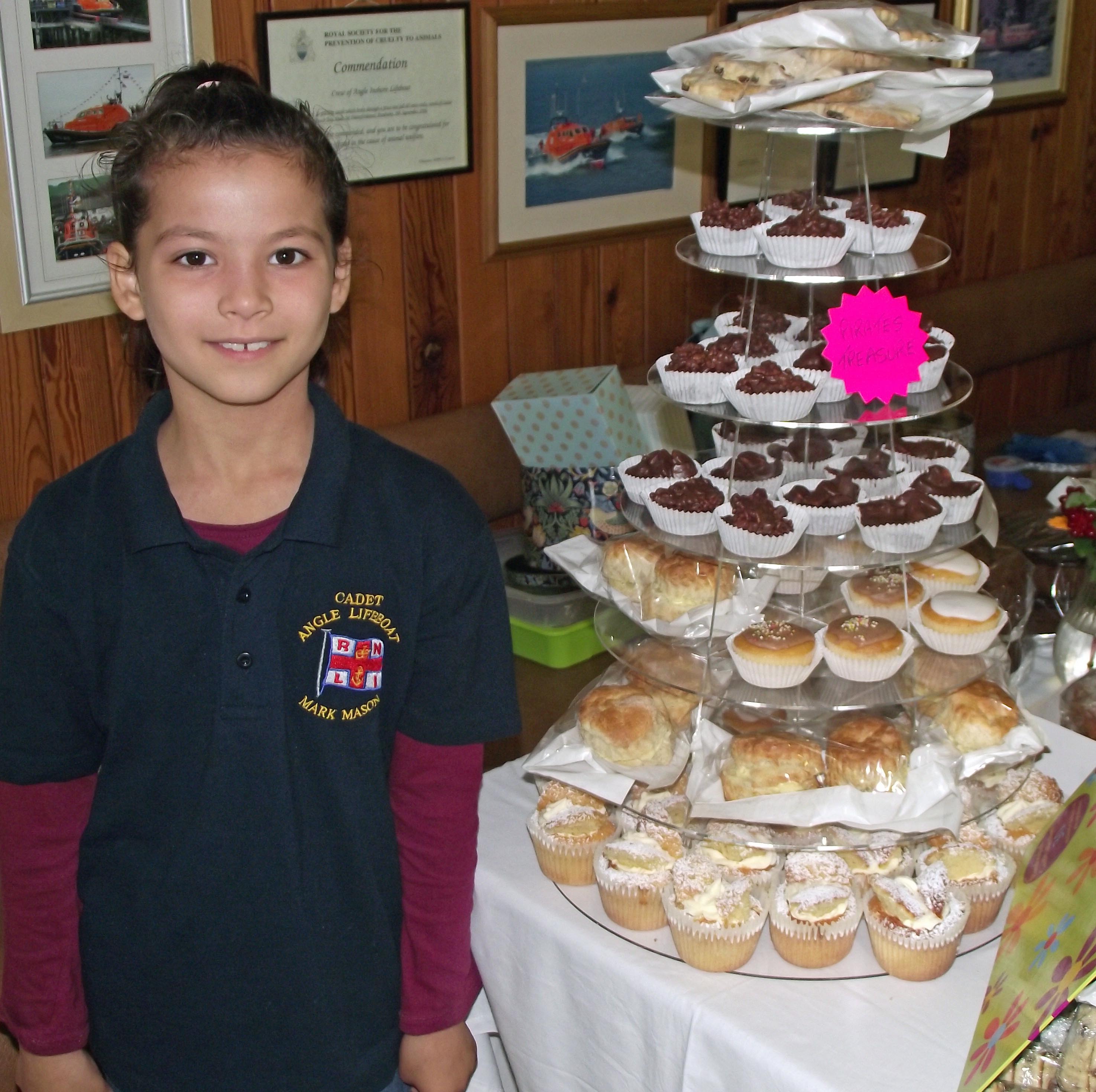 Young Andrea Stringer, who helped out at the cake stall at Angle RNLI’s open day. Andrea is the daughter of Angle RNLI Mechanic Adam Stringer and Hooi Stringer.