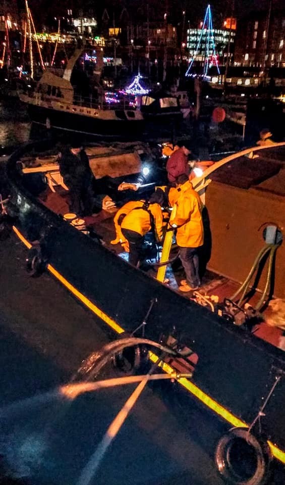 The crew onboard the Cervia manning the pumps.