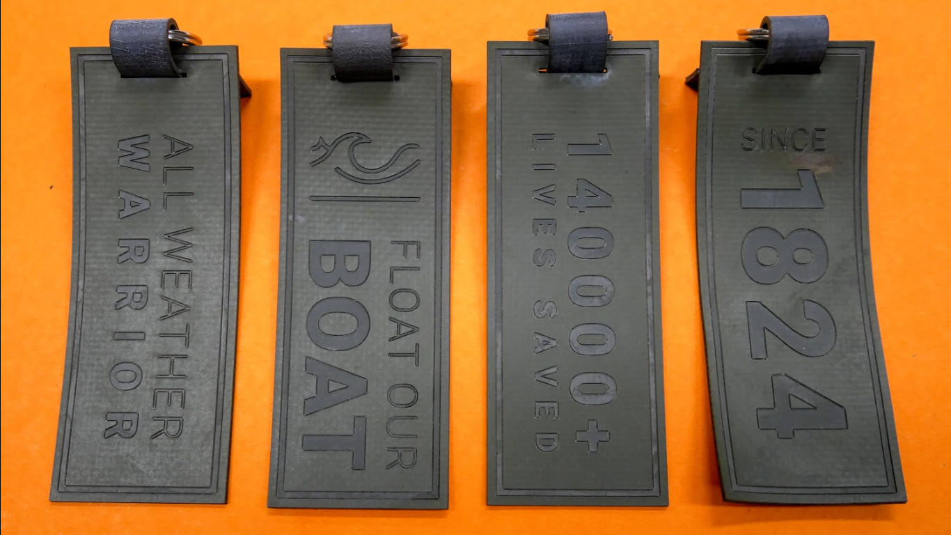 Royal College of Art students' concept design for keyrings made out of part of a decommissioned lifeboat