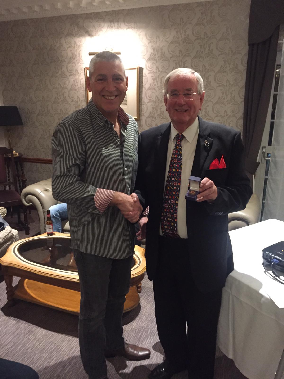 Rod was presented with his award by Jim Carter, President 