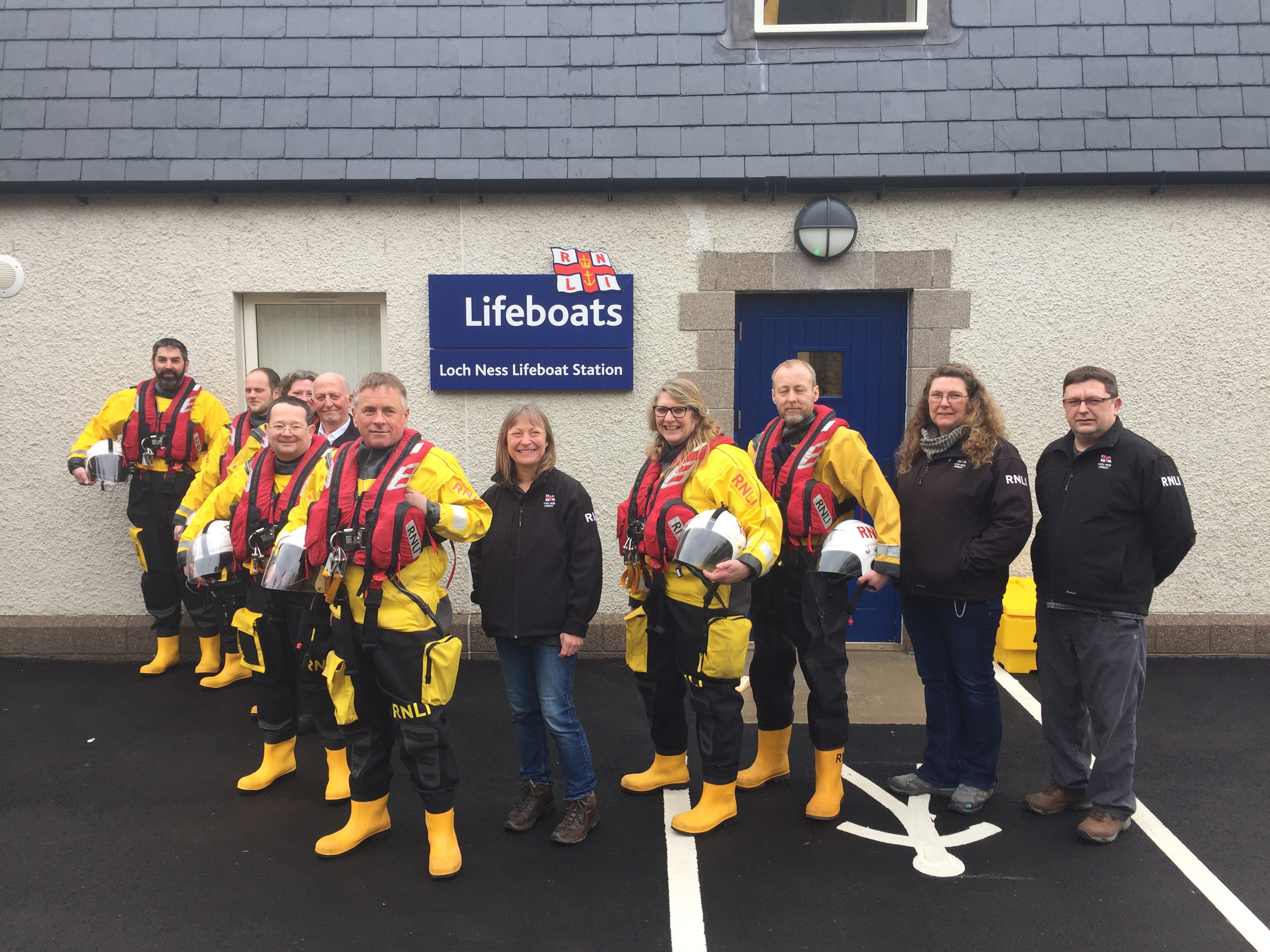 Some of the crew outside the new station