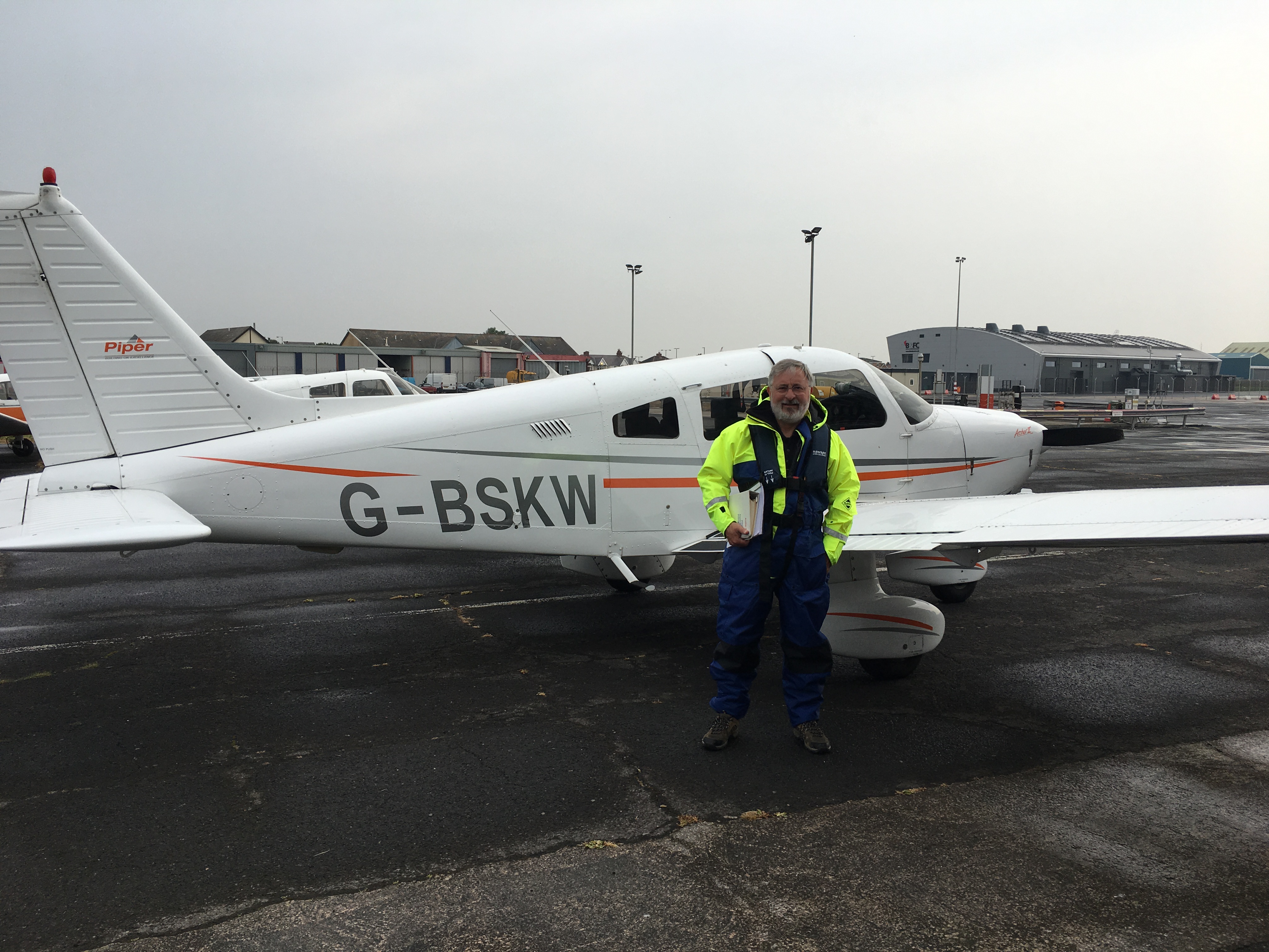 Ian Butter is pictured in front of the light aircraft he flew to complete his challenge.