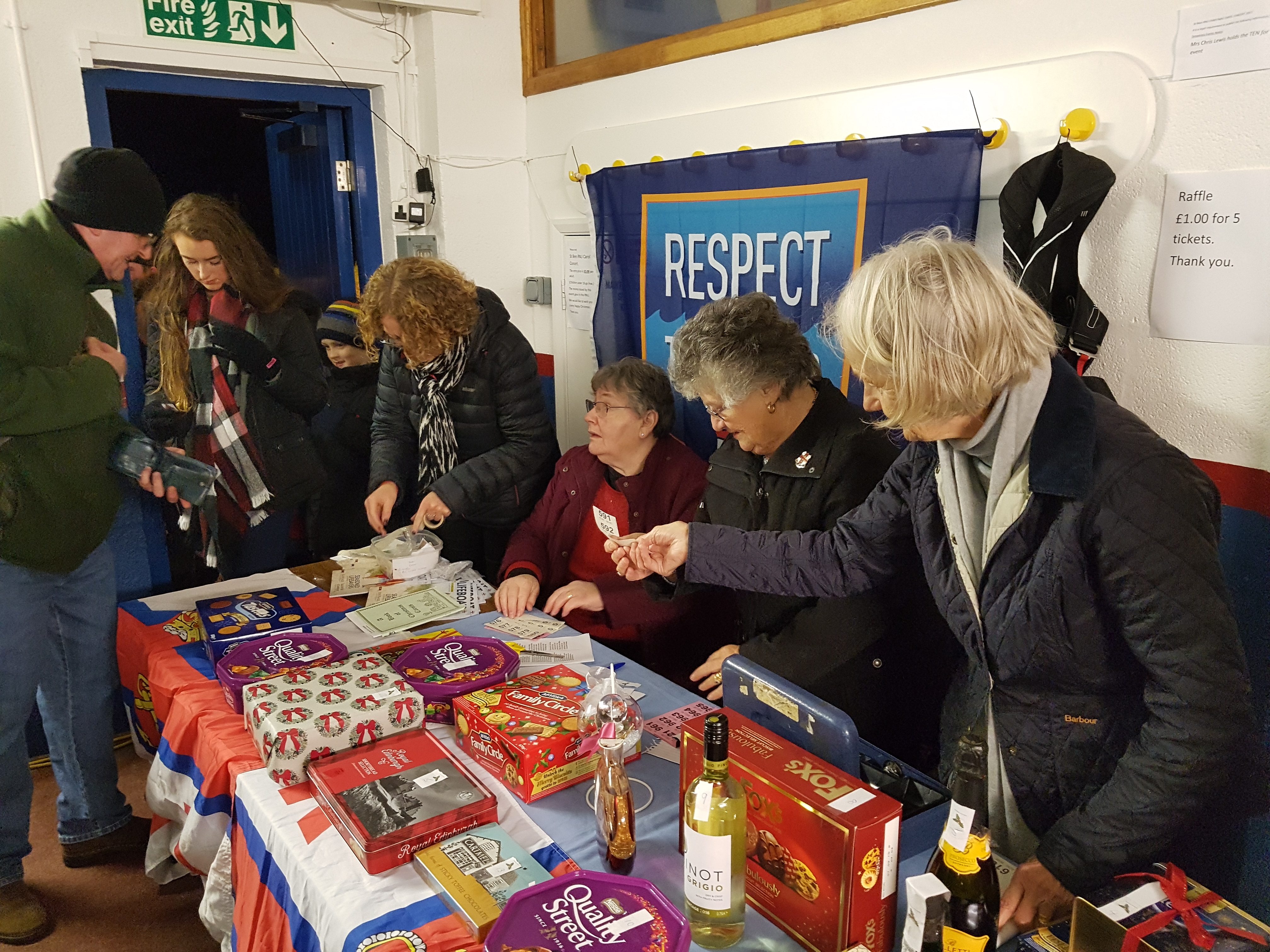 Members of the St Bees Ladies Guild selling raffle tickets at the lifeboat carol concert