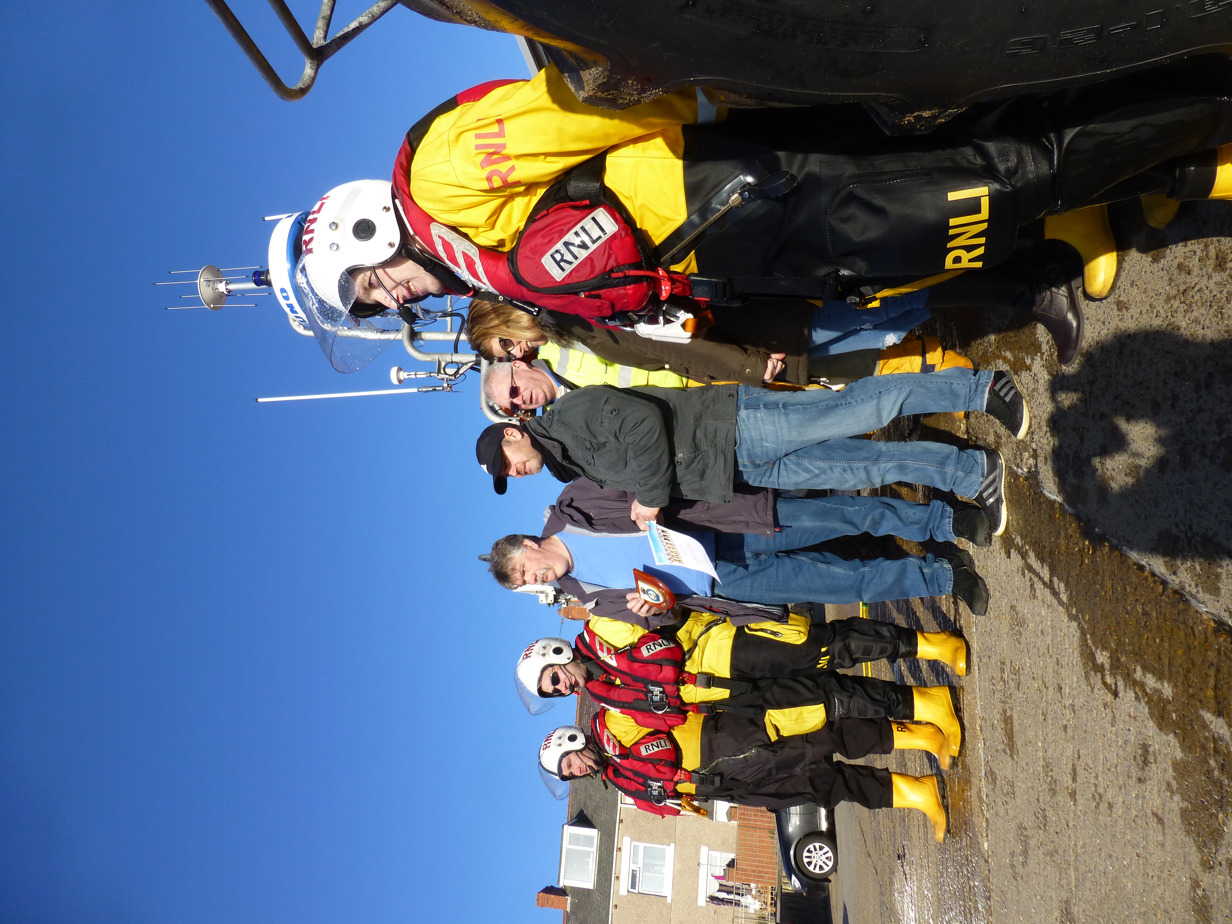 Mark and his wife present the donation to Newbiggin's volunteers
