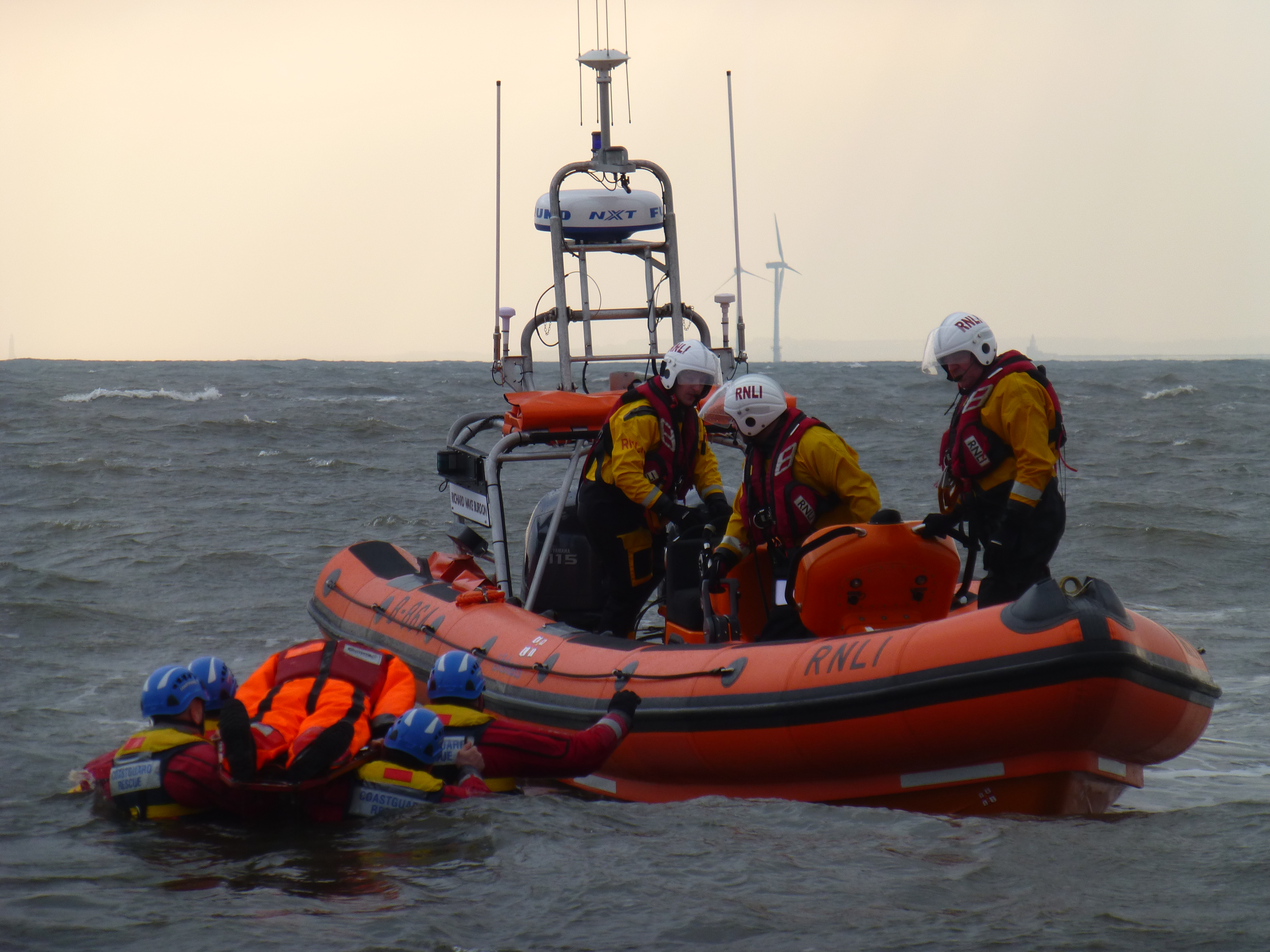 A series of photographs showing the joint exercise with the lifeboat along with Newbiggin and Blyth Coastguard rescue teams