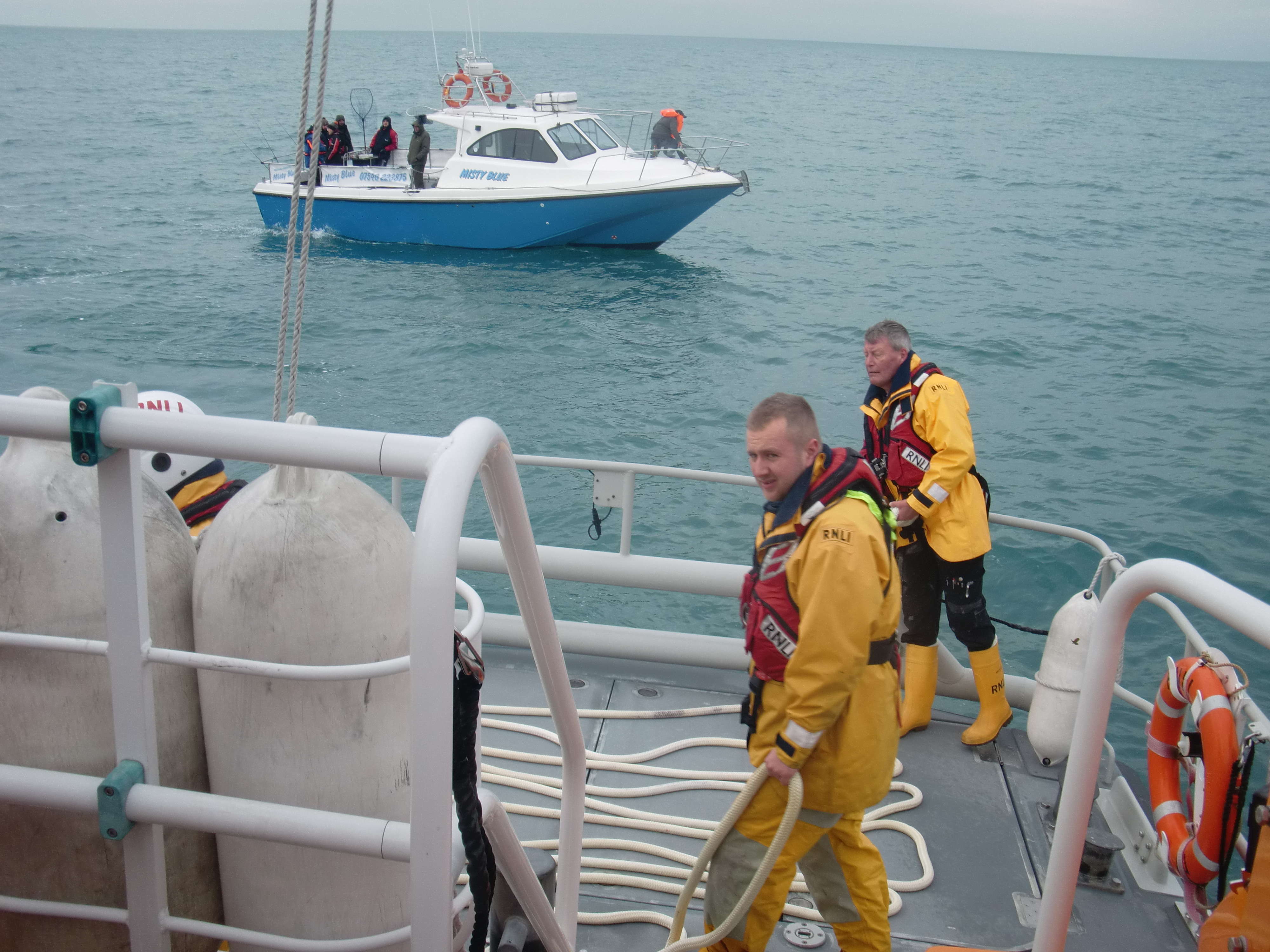 Volunteer crew making ready to set up tow
