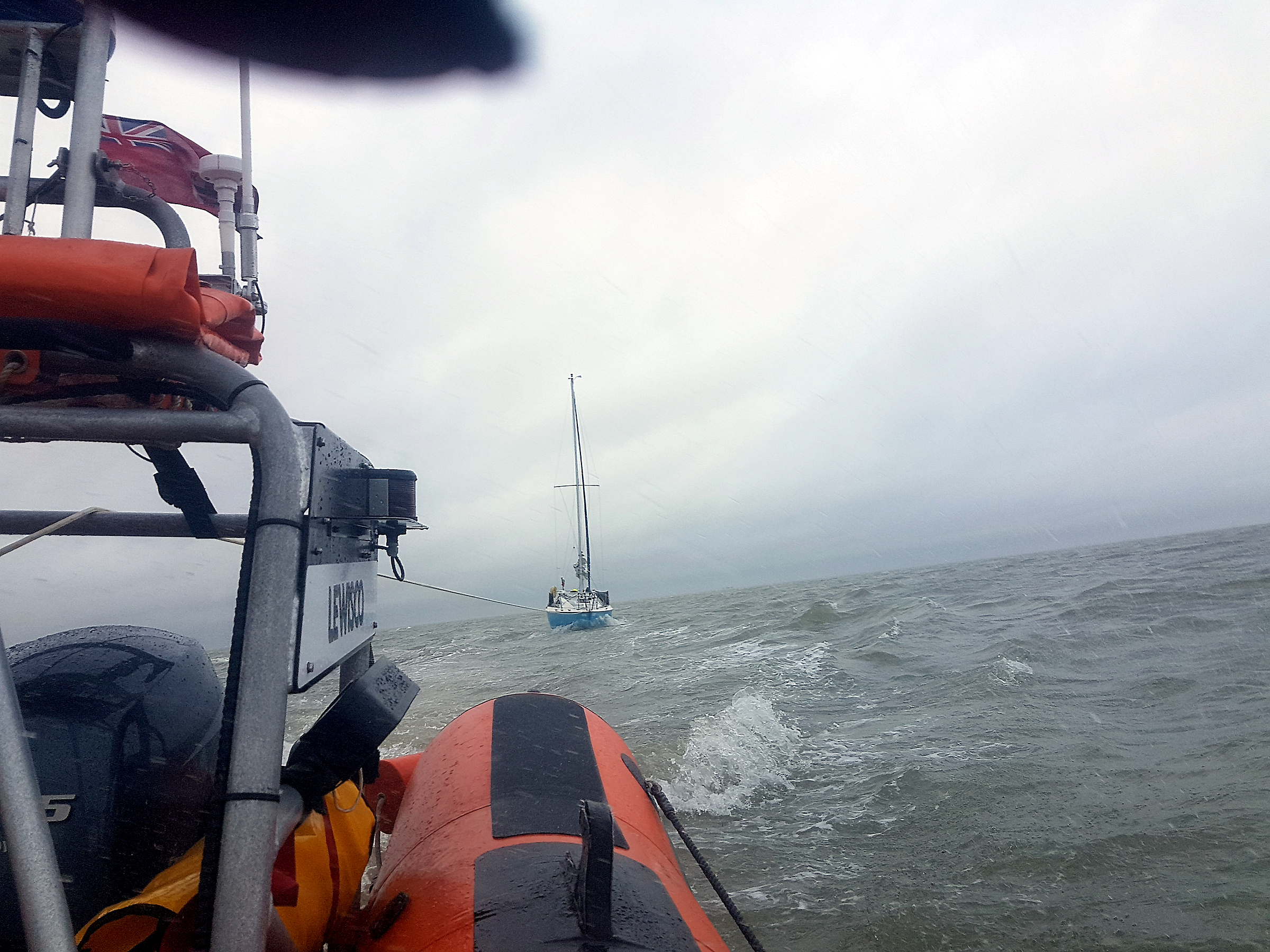 The 22-foot yacht under tow by the Whitstable lifeboat after the craft suffered engine failure 2-miles off Whitstable on Tuesday afternoon. Picture: Tim Smith/RNLI Whitstable