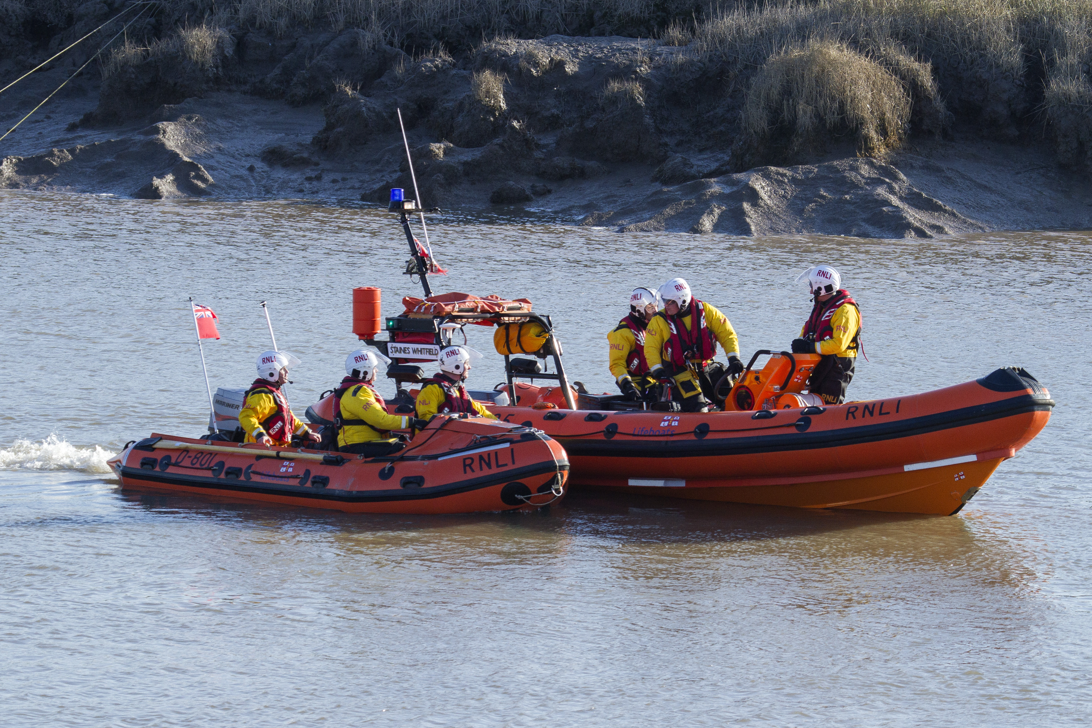 Library picture of lifeboats searching in River Brue