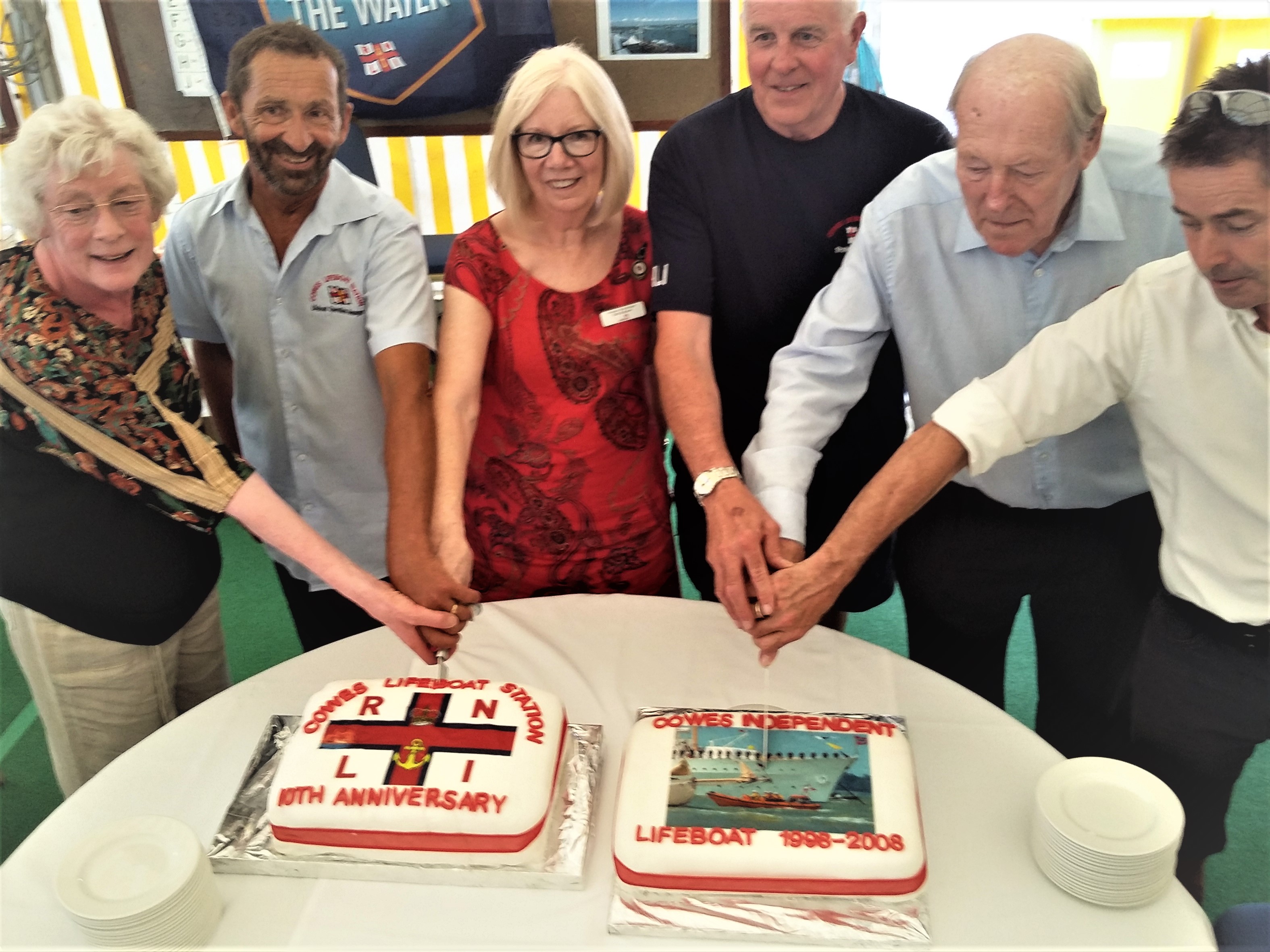 Cake cutting to mark the two anniversaries.