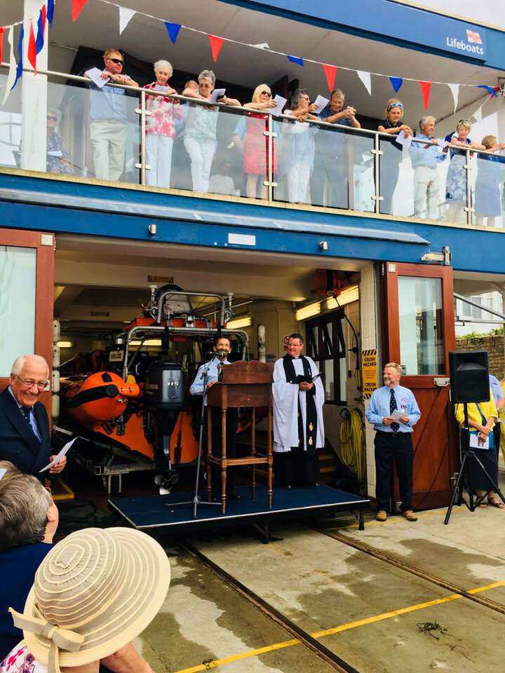 Mark Southwell addresses guests at the station.